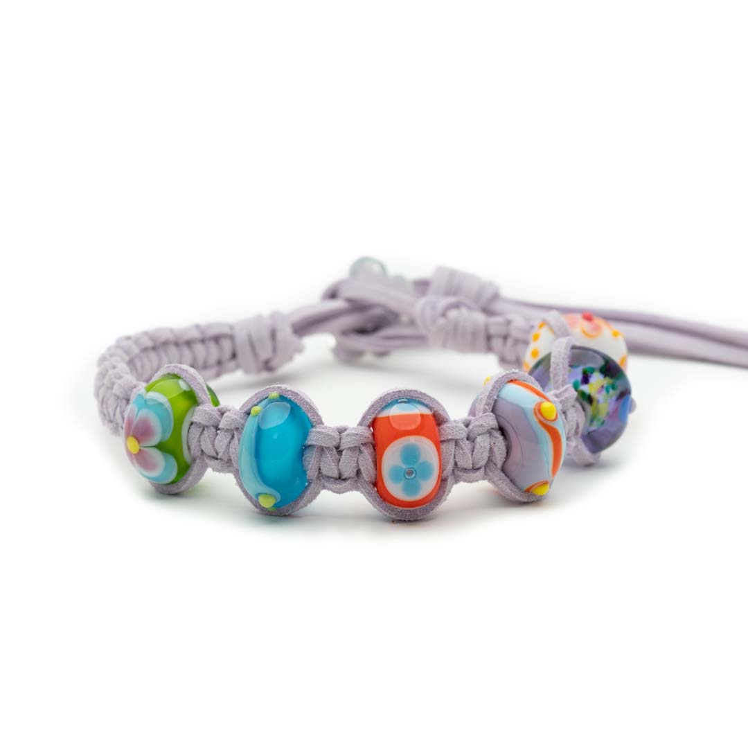 Thistle cord macrame bracelet with colourful Murano glass surf travel beads.