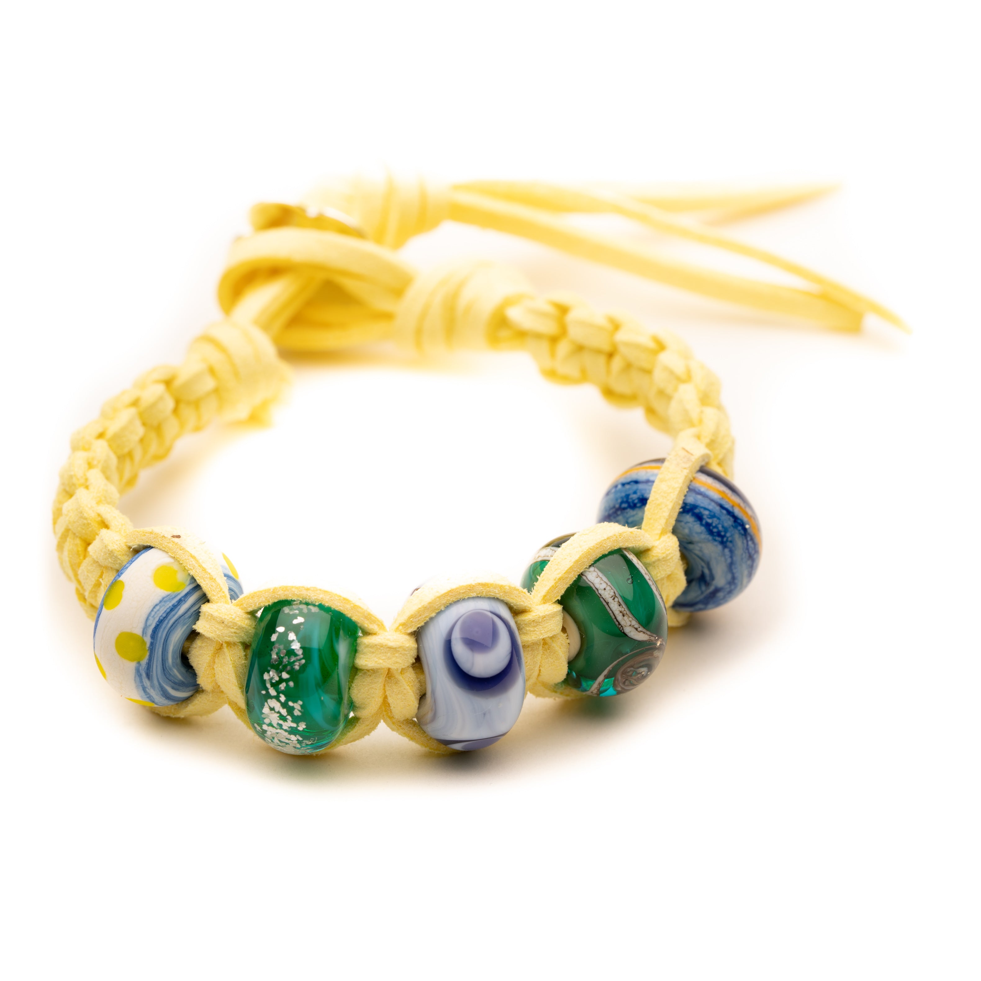 Macrame bracelet with beach inspired beads on lemon colour cord.