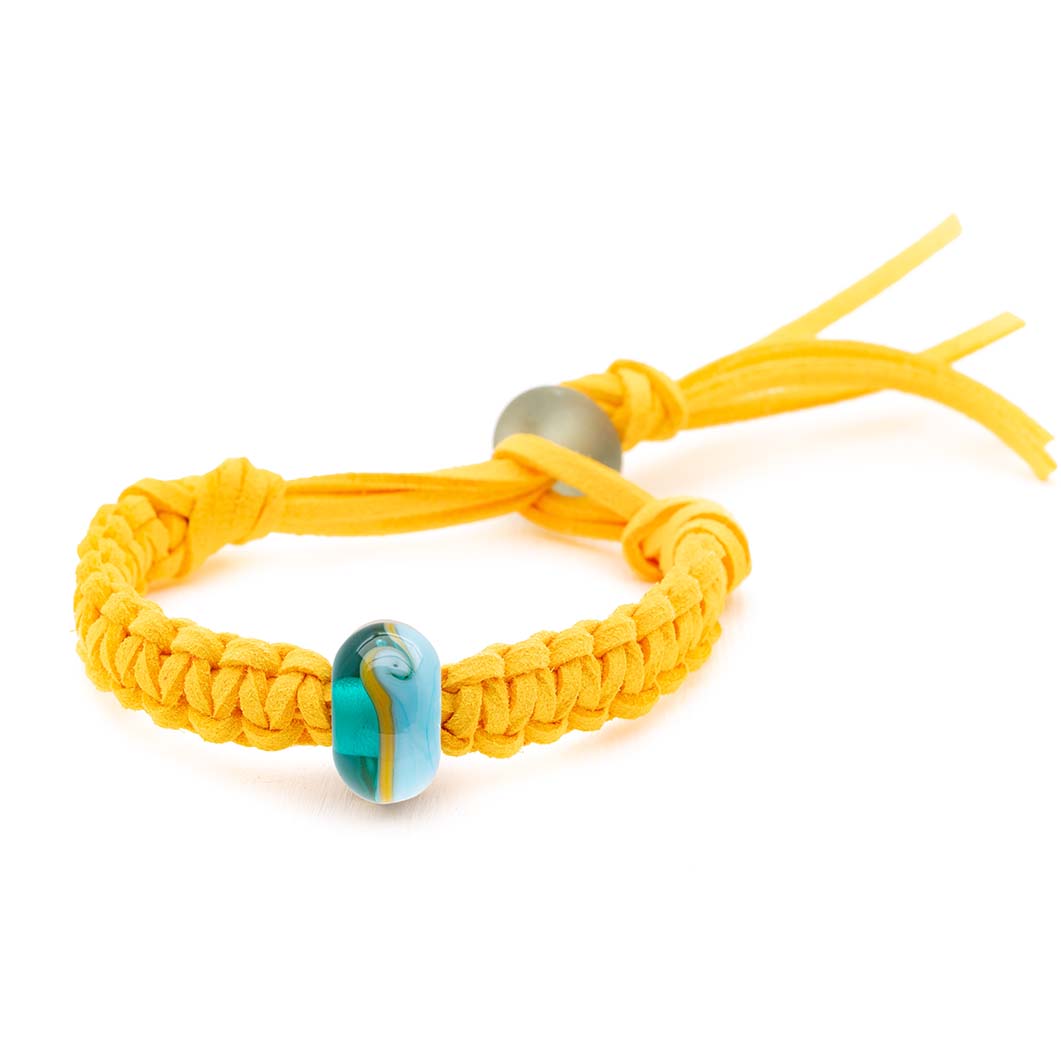 Blue, yellow and teal glass bead bracelet being sold in support of the North Devon Biosphere charity.