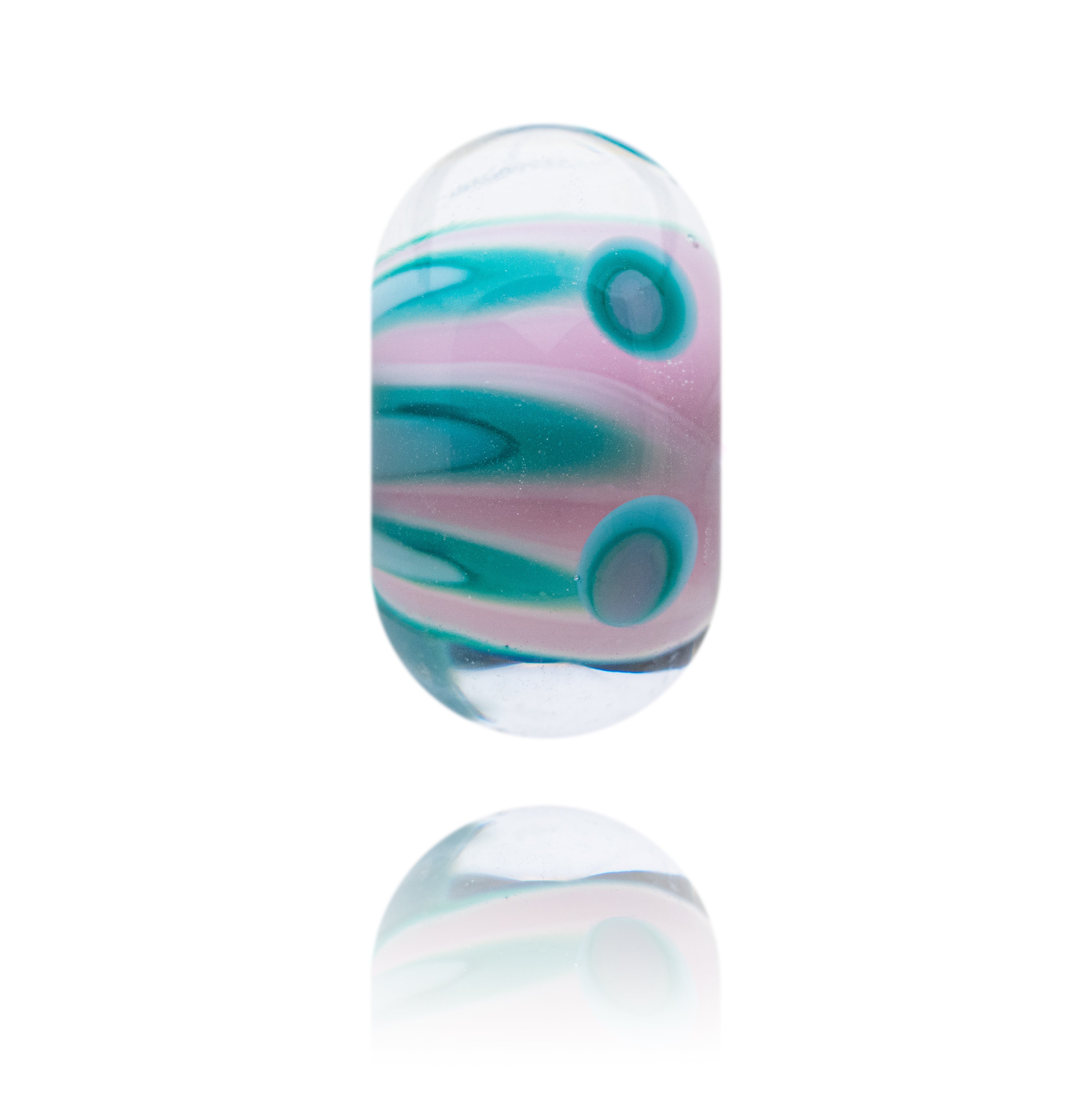 Colorful glass bead with swirl patterns on a white background