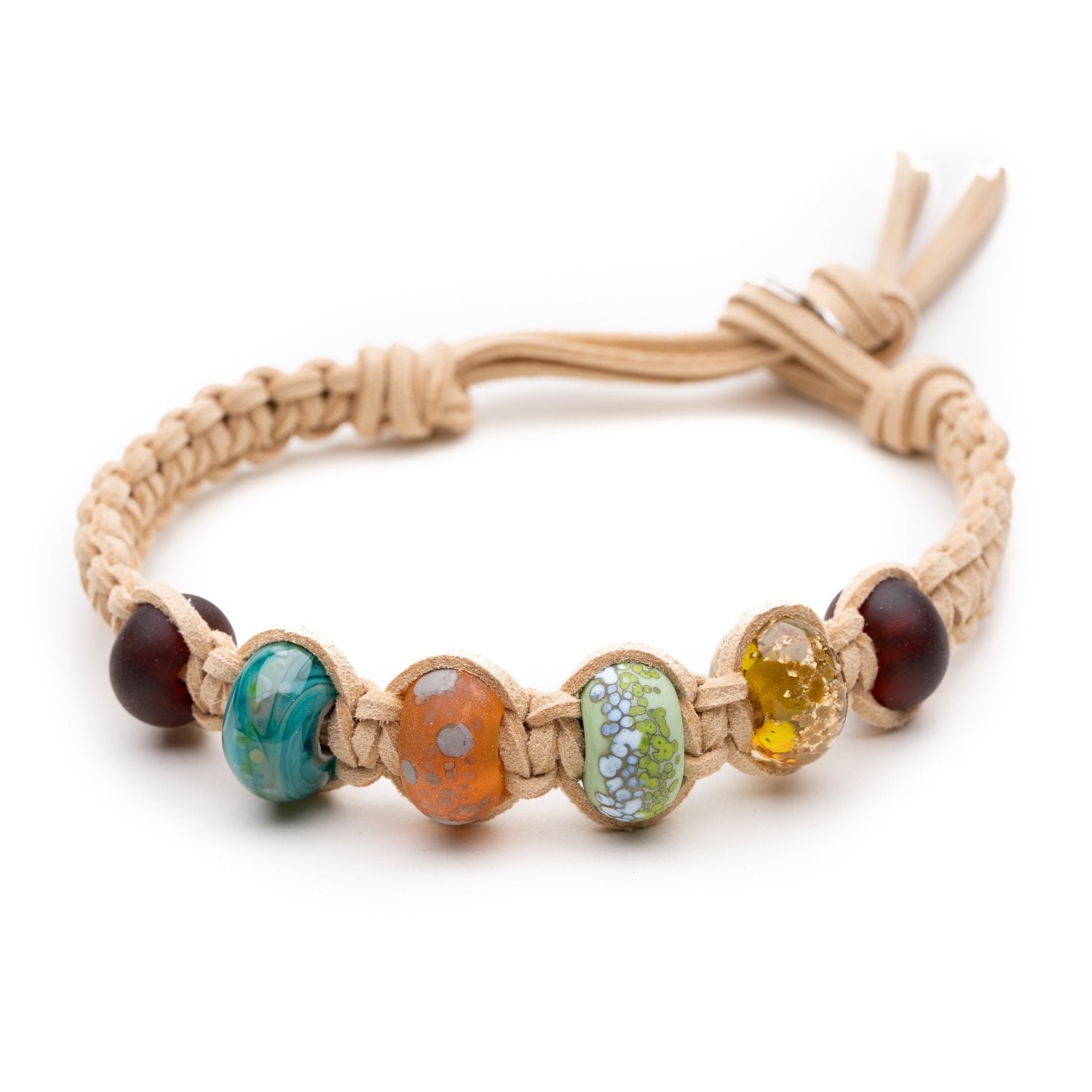 Colourful patterned Murano glass beads representing the UK’s National Parks made into a custom braided bracelet.