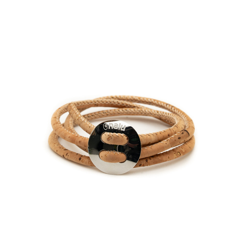 Beige leather wrap bracelet with a metal clasp on a white background