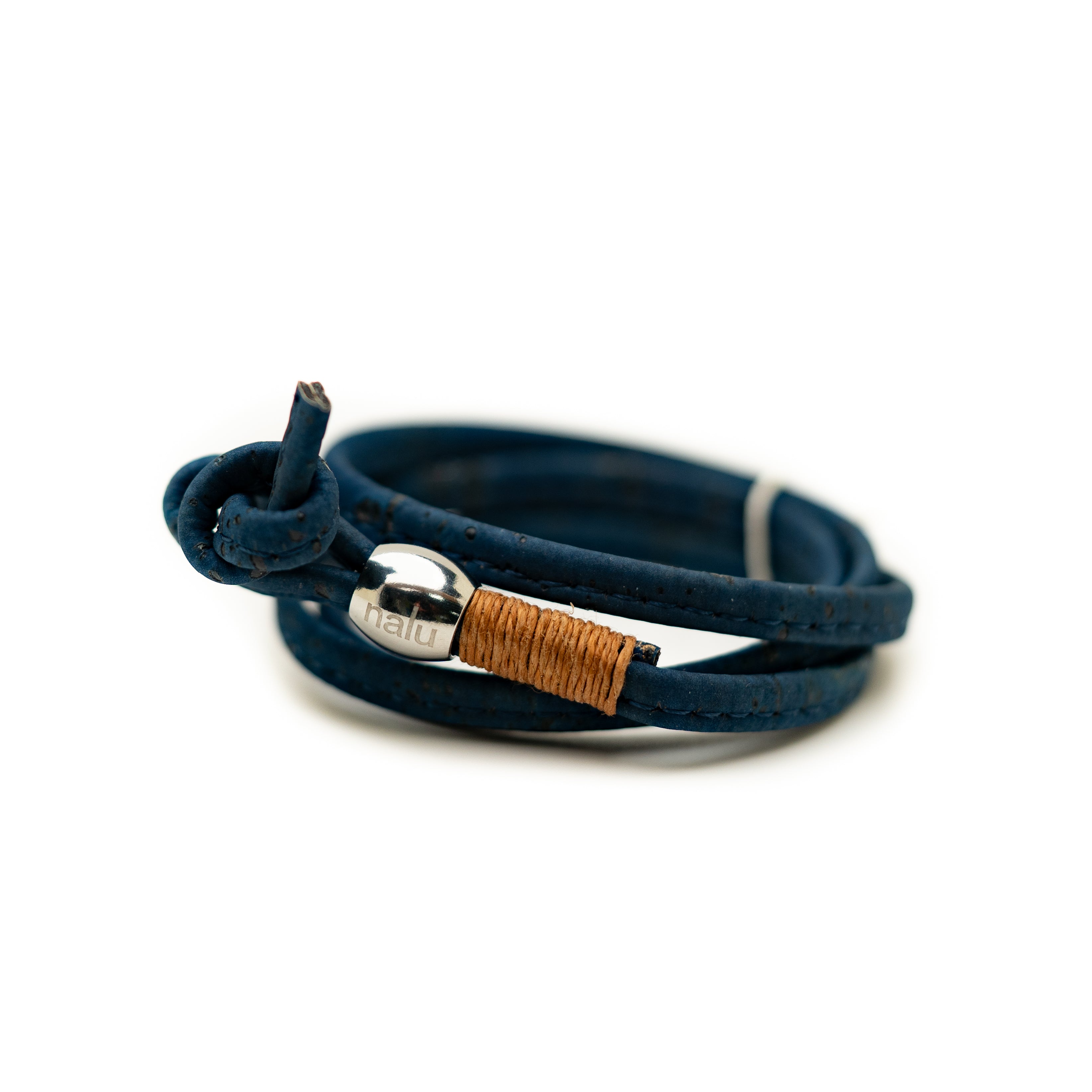 Navy cork bracelet with a metal clasp on a white background