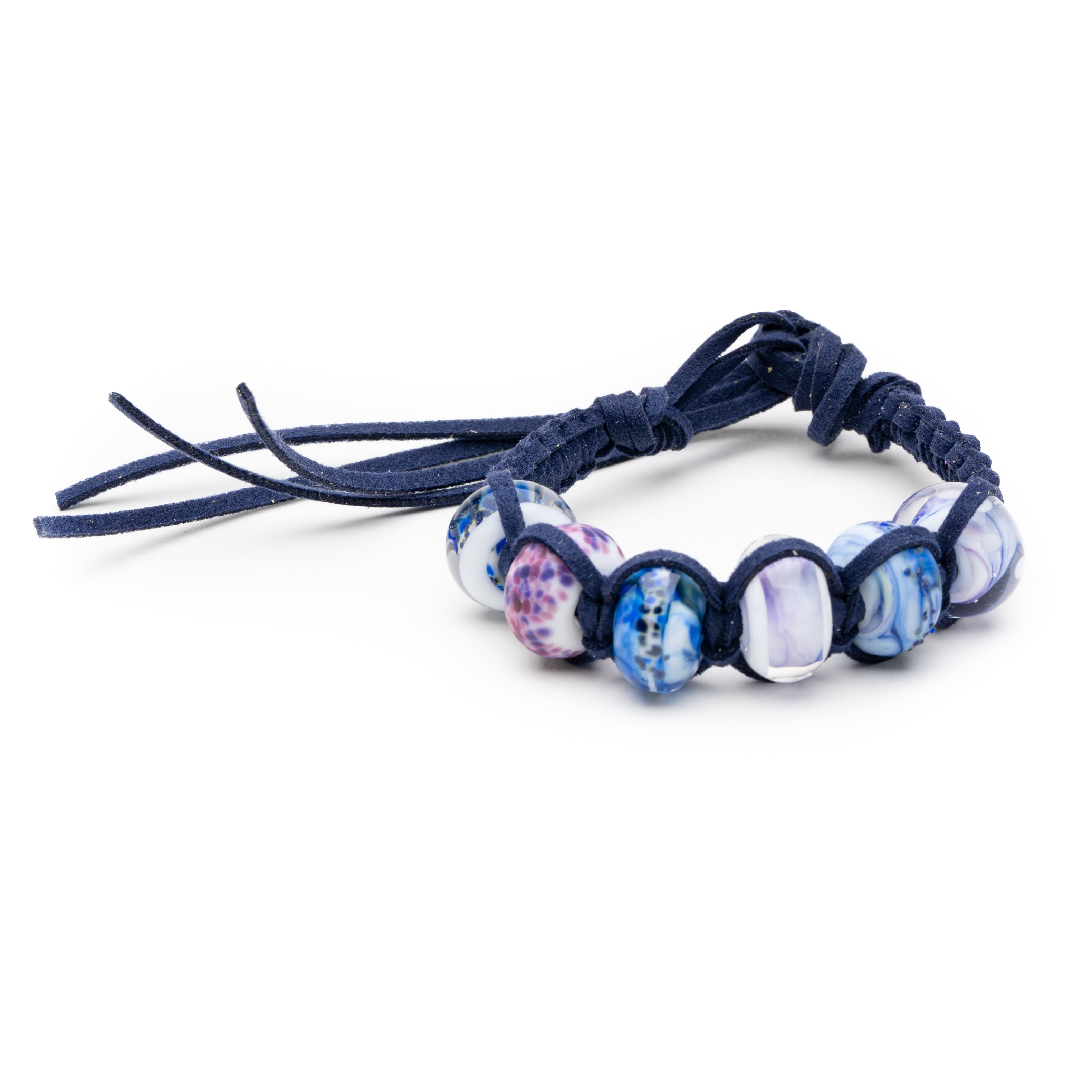 Scottish snow and countryside glass beads on navy cord bracelet.