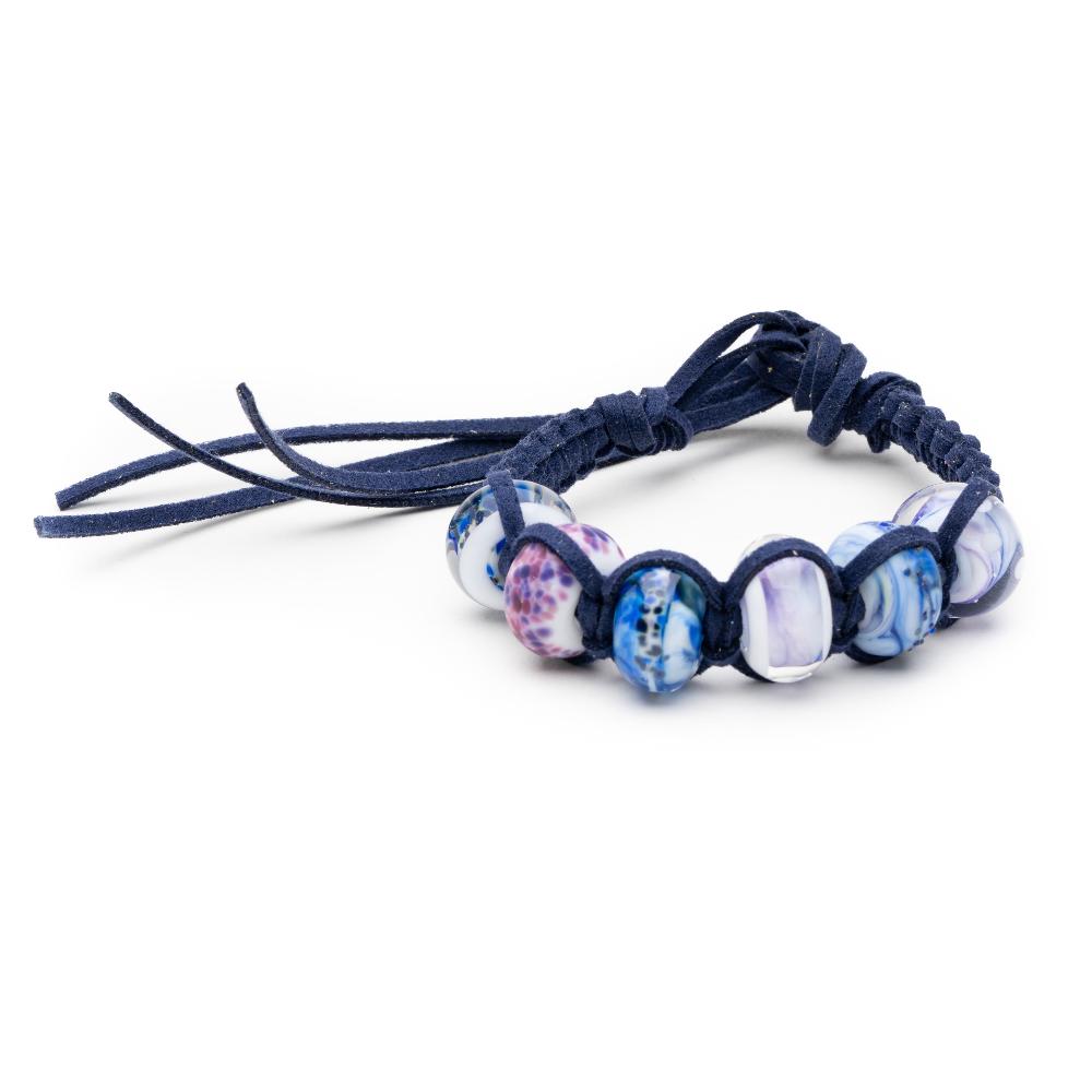 Nalu snow destination beads on navy cord bracelet.