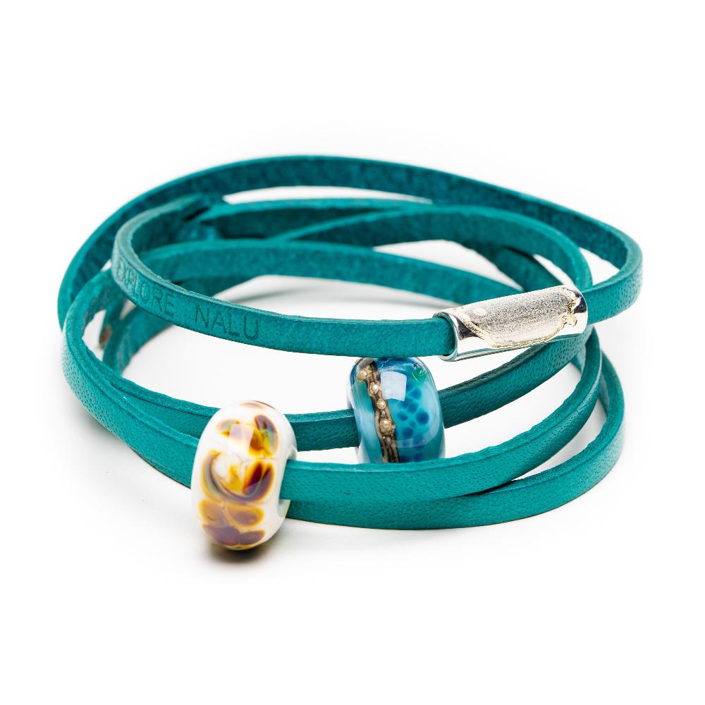 Teal leather bracelet with glass and silver beads.