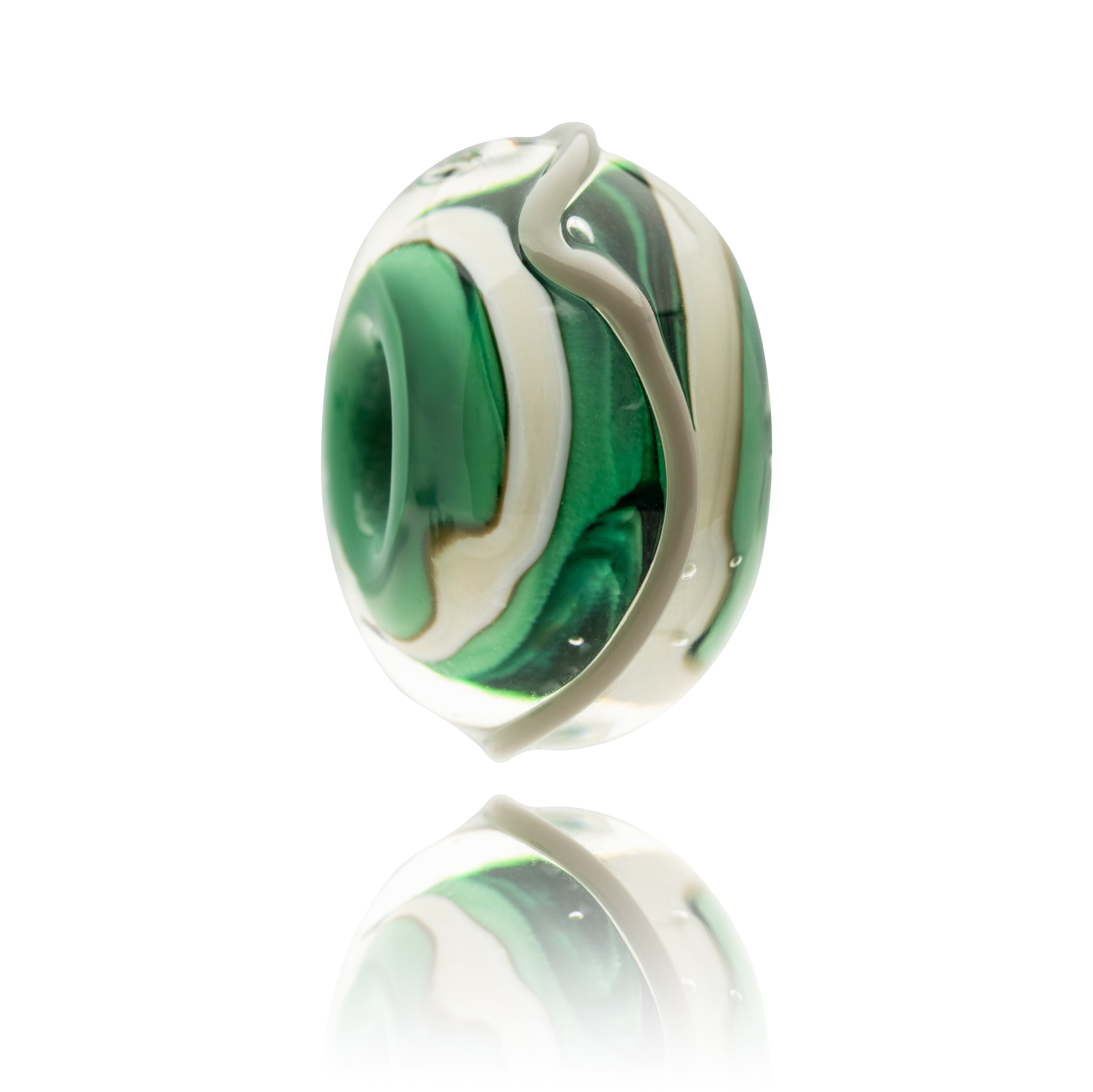 Swirling green glass bead with cream coloured patterns and a grey meandering stripe around the outside.