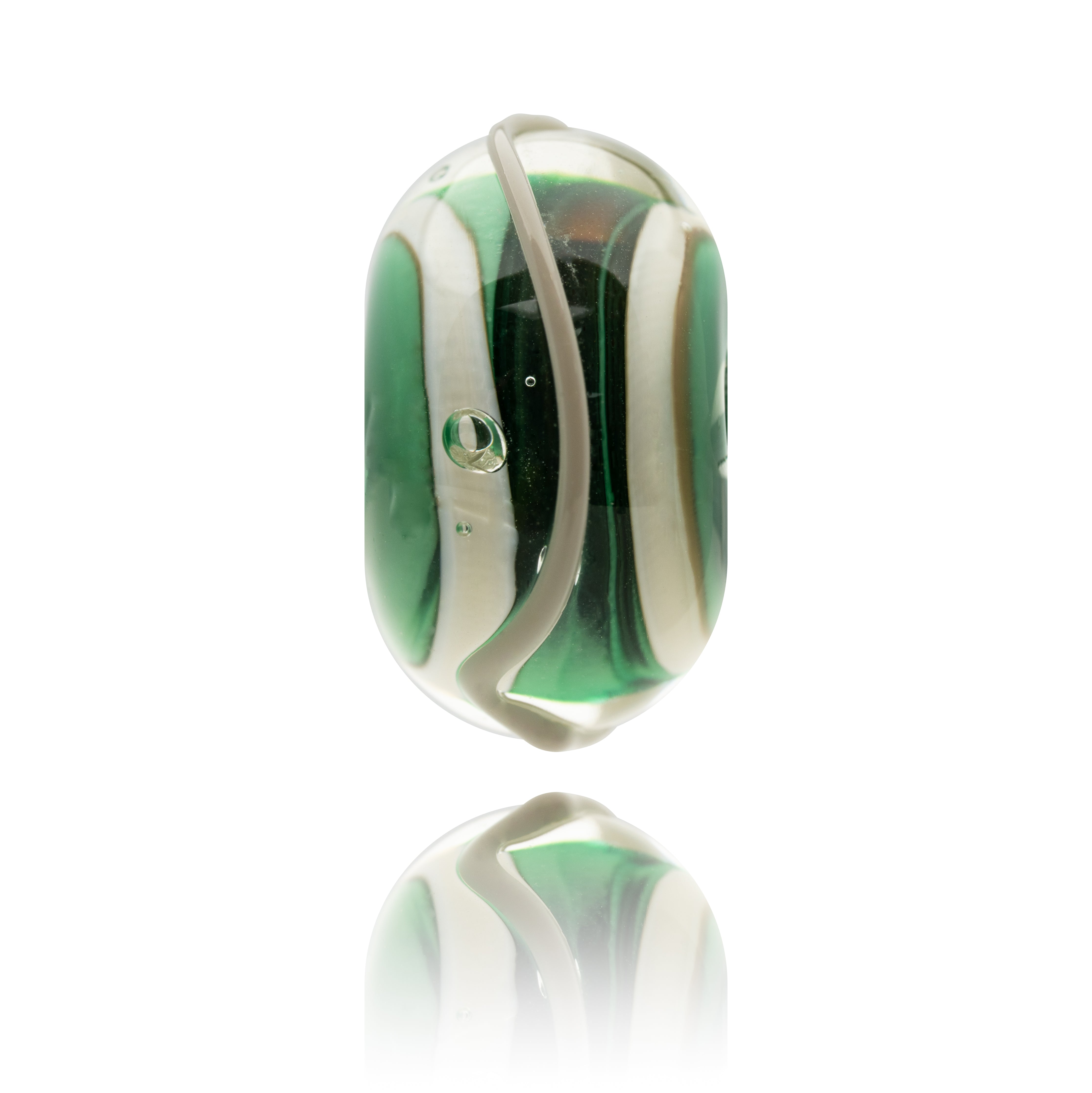 Swirling green glass bead with cream coloured patterns and a grey meandering stripe around the outside.