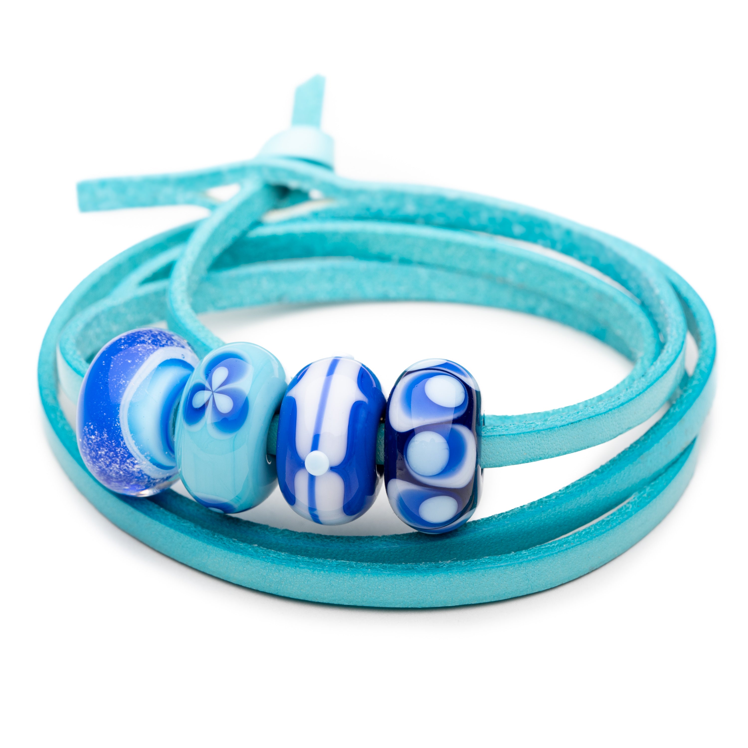 Bright turquoise leather strap bracelet with colourful patterned glass beads.