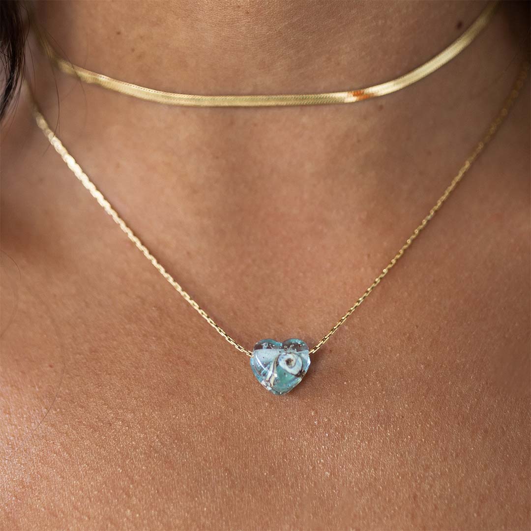 Icy Mint sand heart pendant on gold chain necklace.