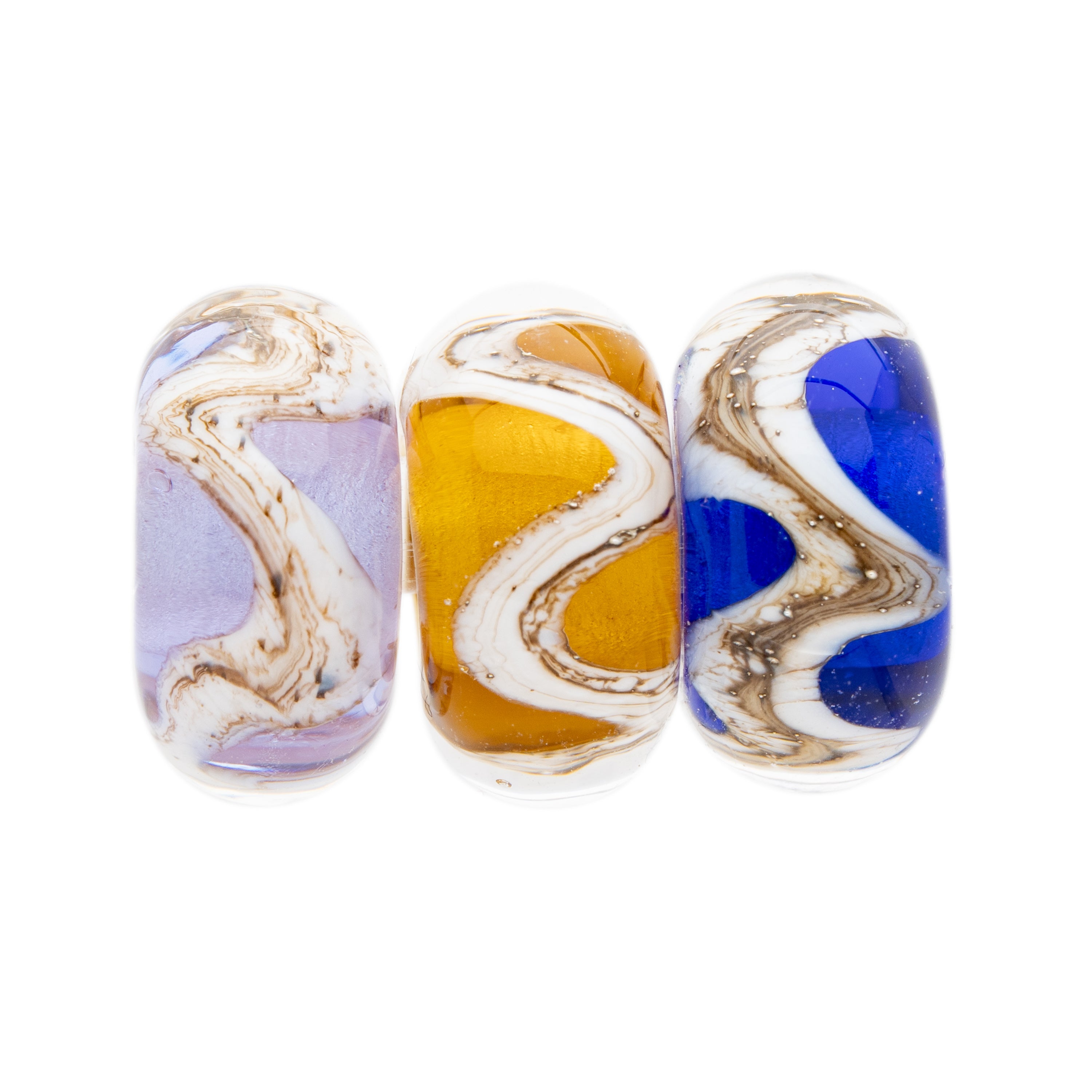 Lavender, amber and dark blue glass beads wrapped with swirling silver sand pattern, representing the Scottish coastline.