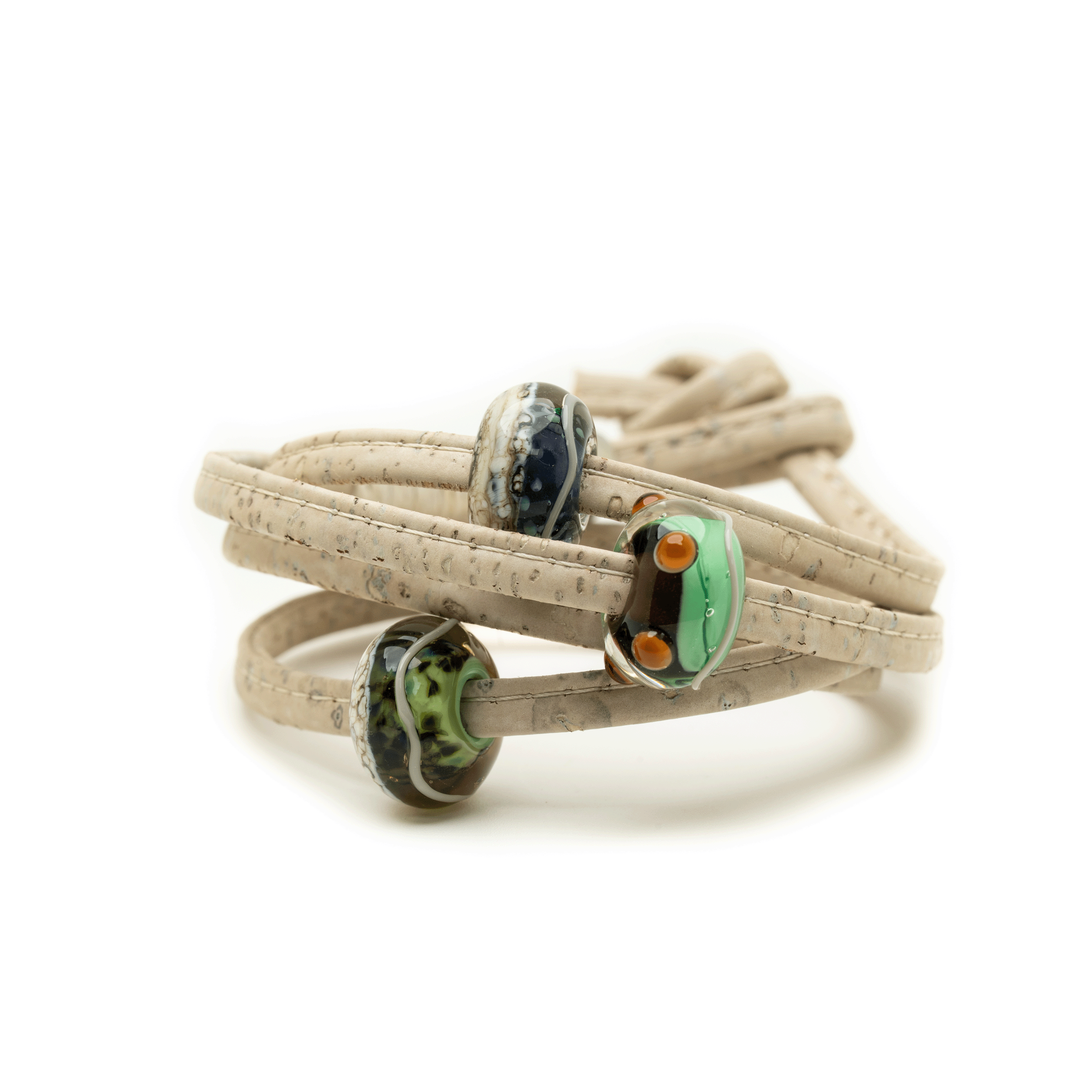 Beige wrap bracelet with decorative beads on a white background