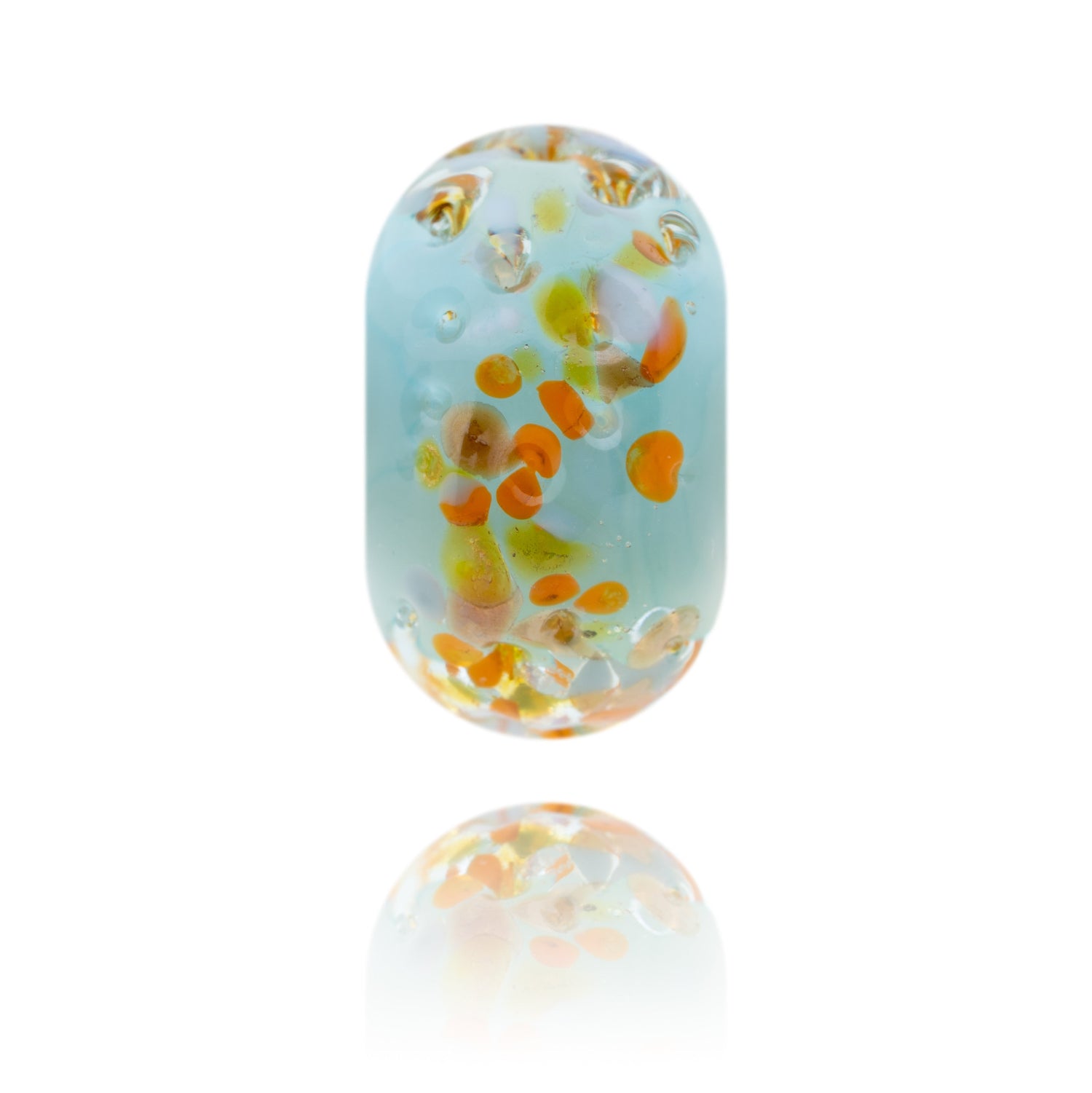 Pale blue glass bead with orange, green and white dots on the surface, designed to represent Seaford in Sussex.