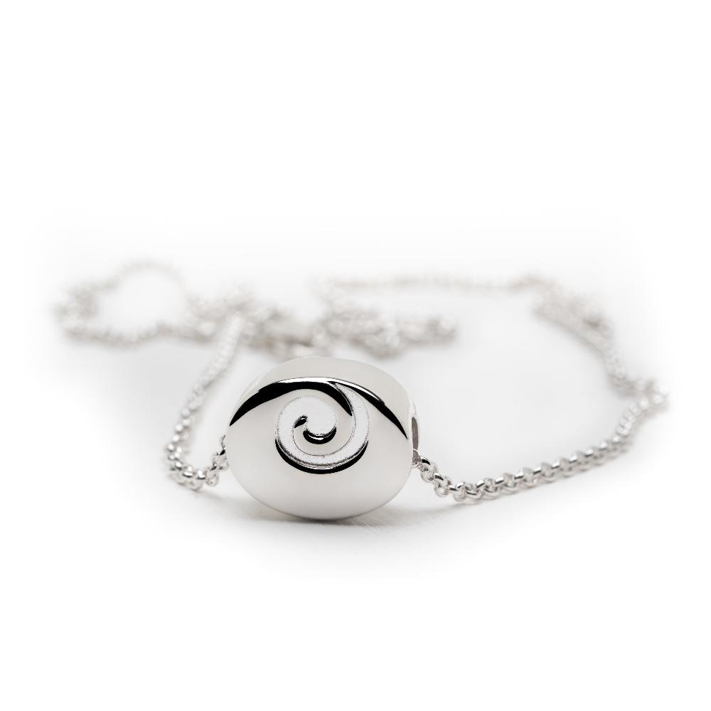 Solid silver Nalu Swirl charm on fine silver chain necklace.