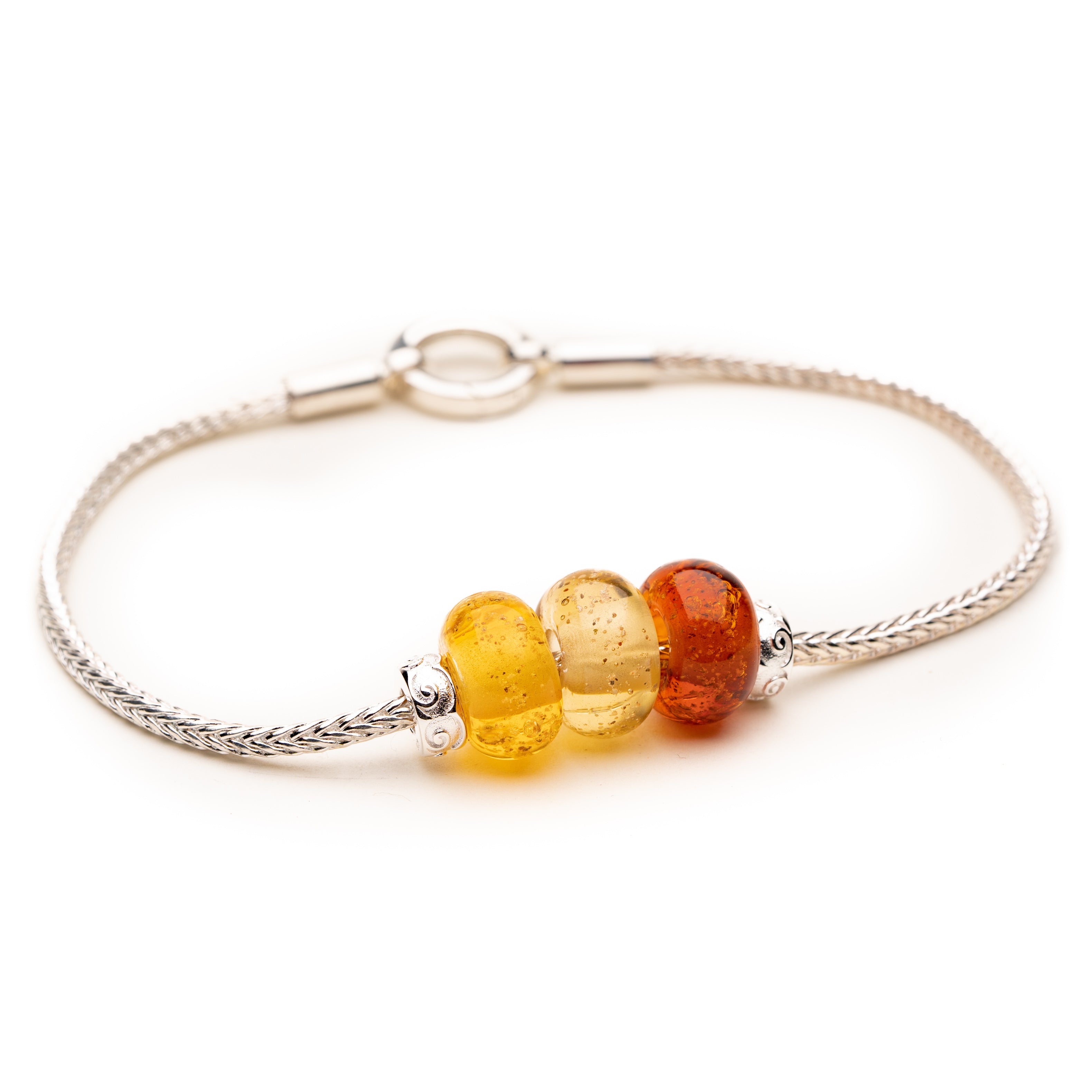 Sand beads in amber shade on silver anklet.