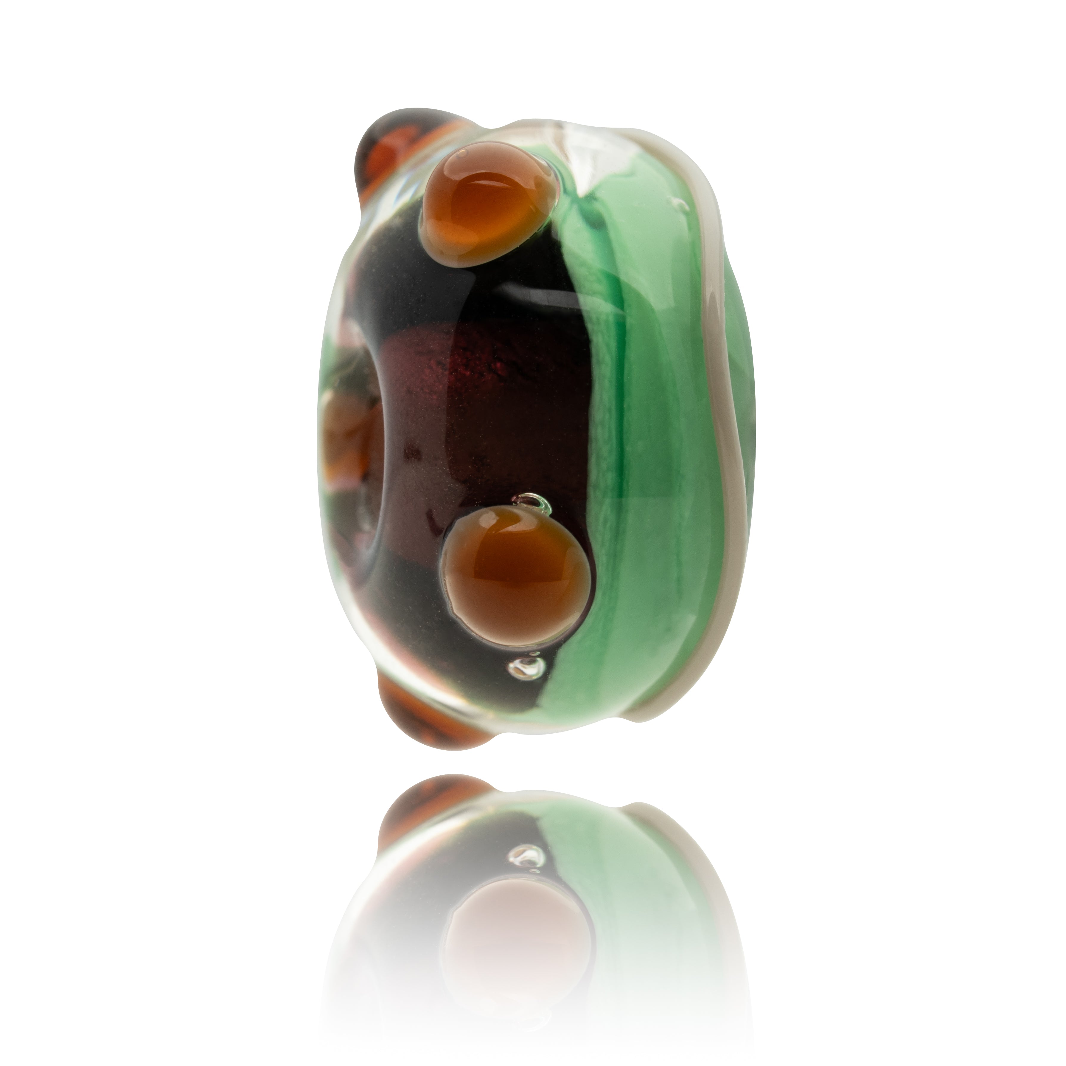 Multicolored glass bead on a white background