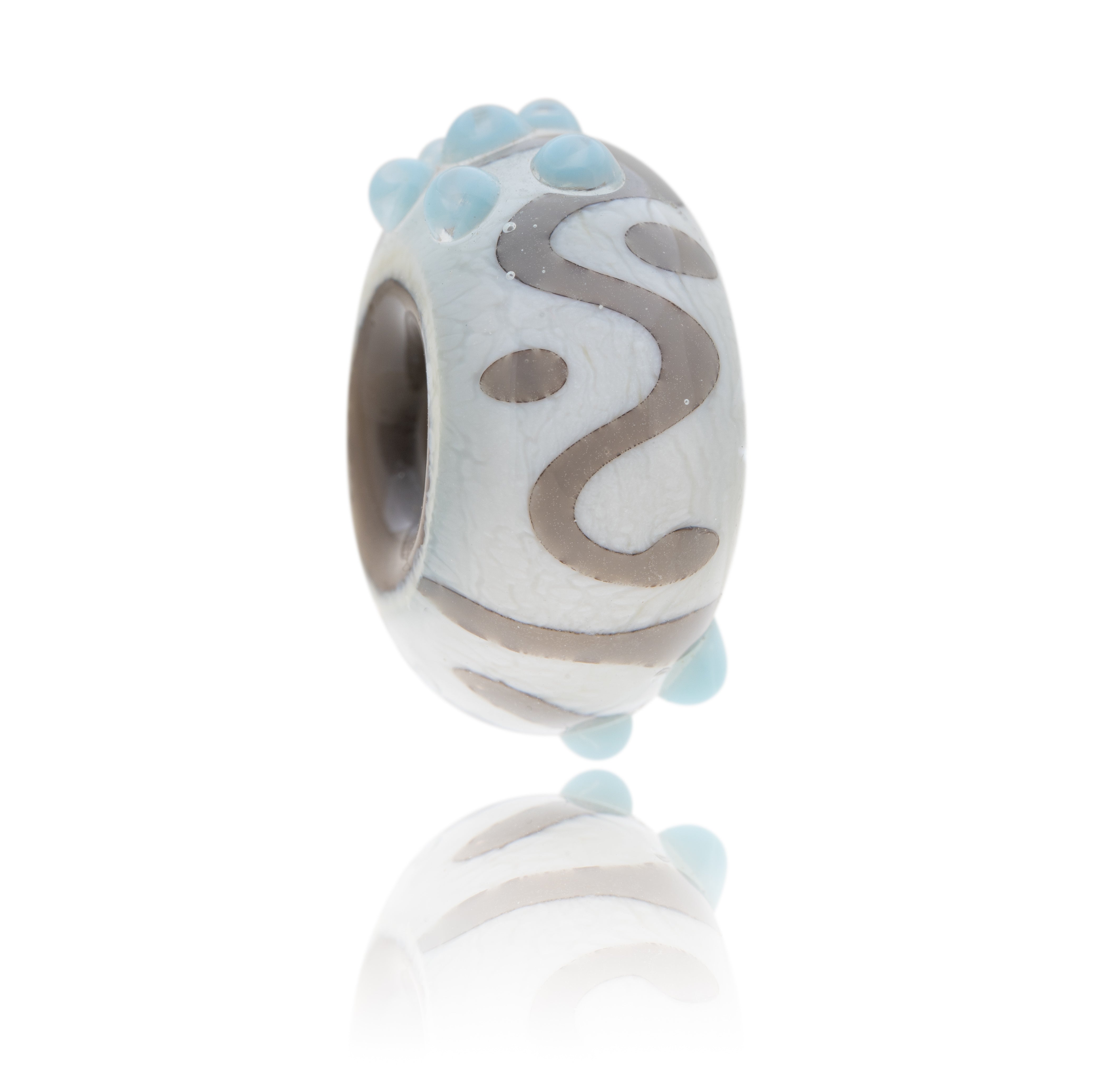 Grey, blue and white patterned bead representing St Agnes in Cornwall.