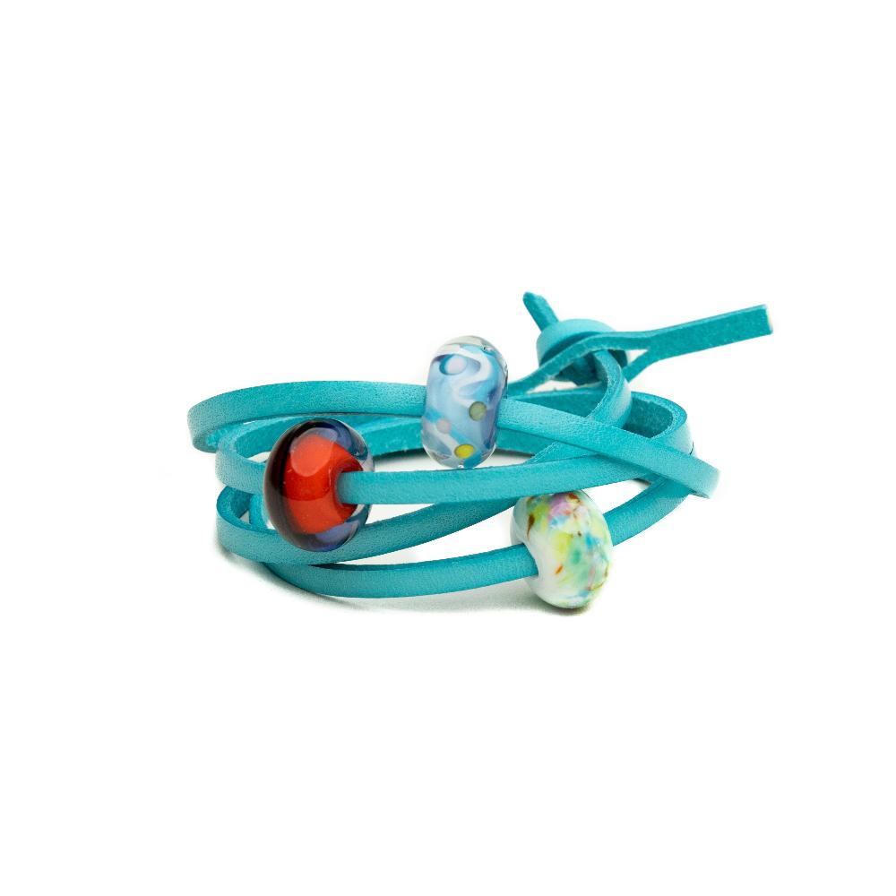 Turquoise leather wrap bracelet with colourful glass beads in collaboration with artist Steve PP.