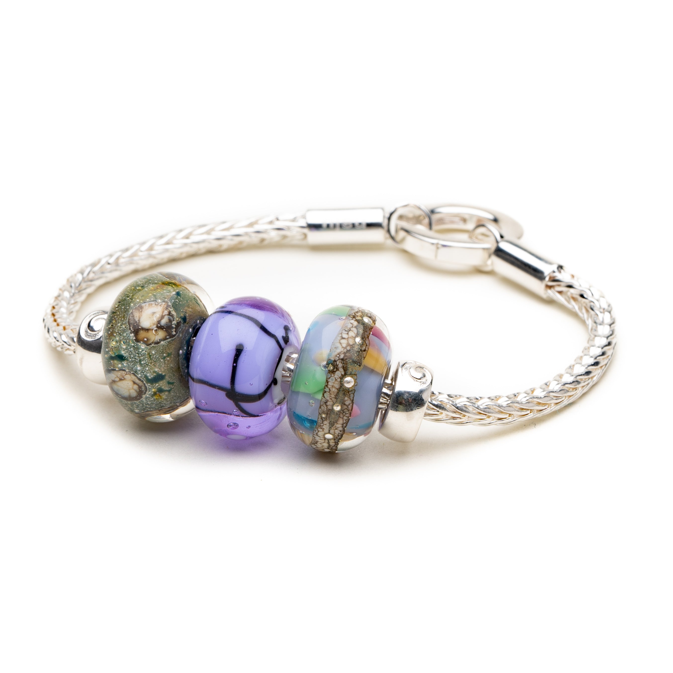 Sterling silver bracelet with colourful glass beads for Suffolk on it.