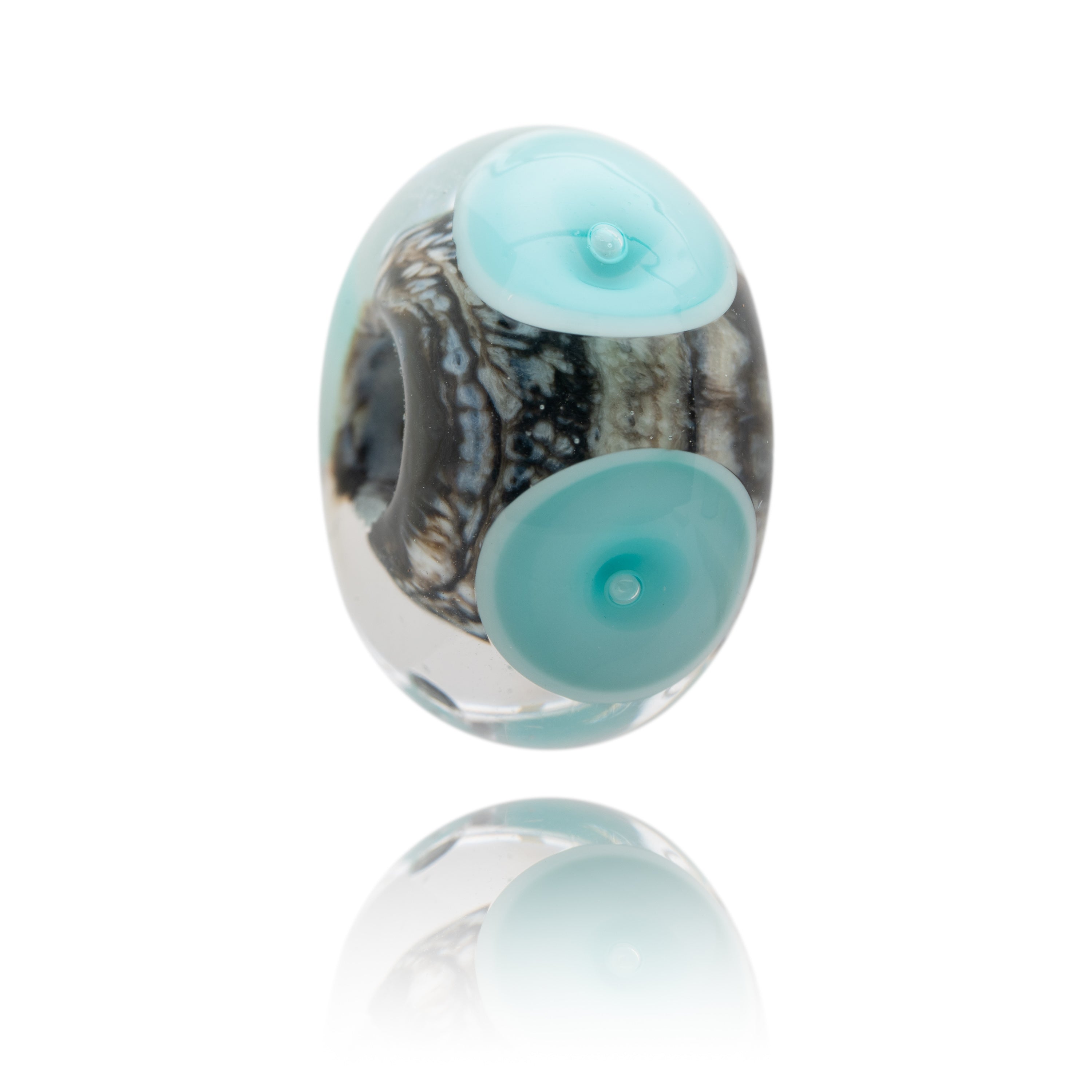 Glass bead representing Summerleaze beach in Bude, Cornwall. Made with Brown core and turquoise dots on the surface.