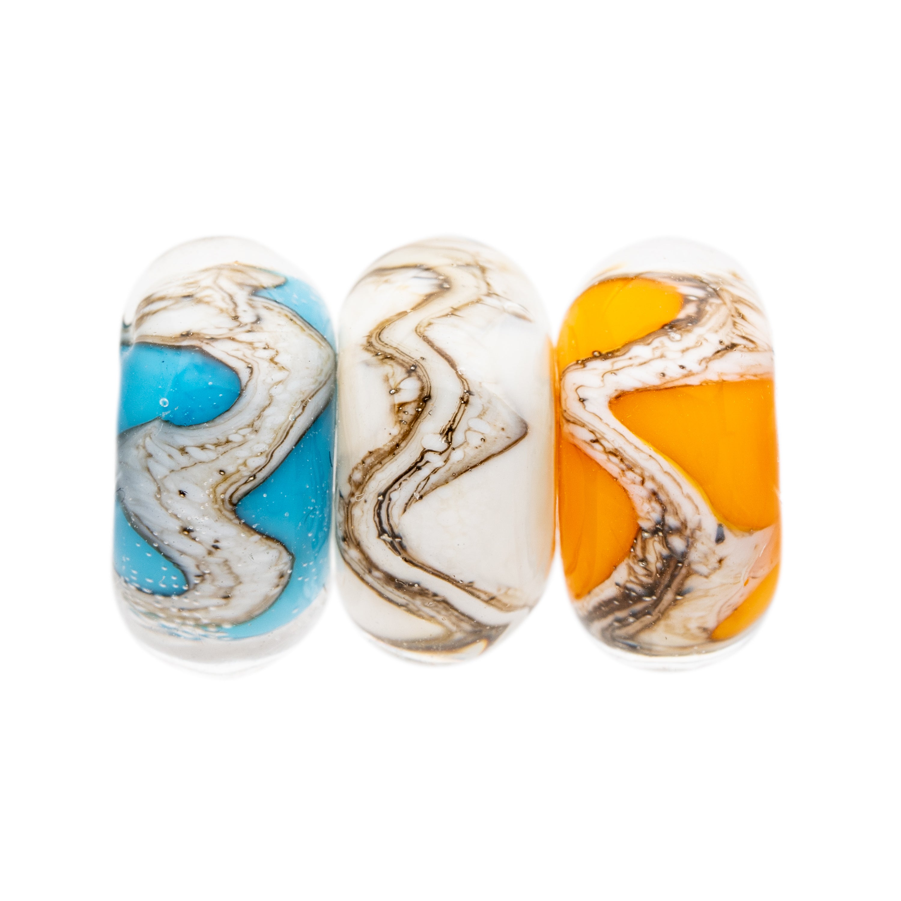 Turquoise, white and orange glass beads wrapped with swirling silver sand pattern, representing the Sussex Coastline.