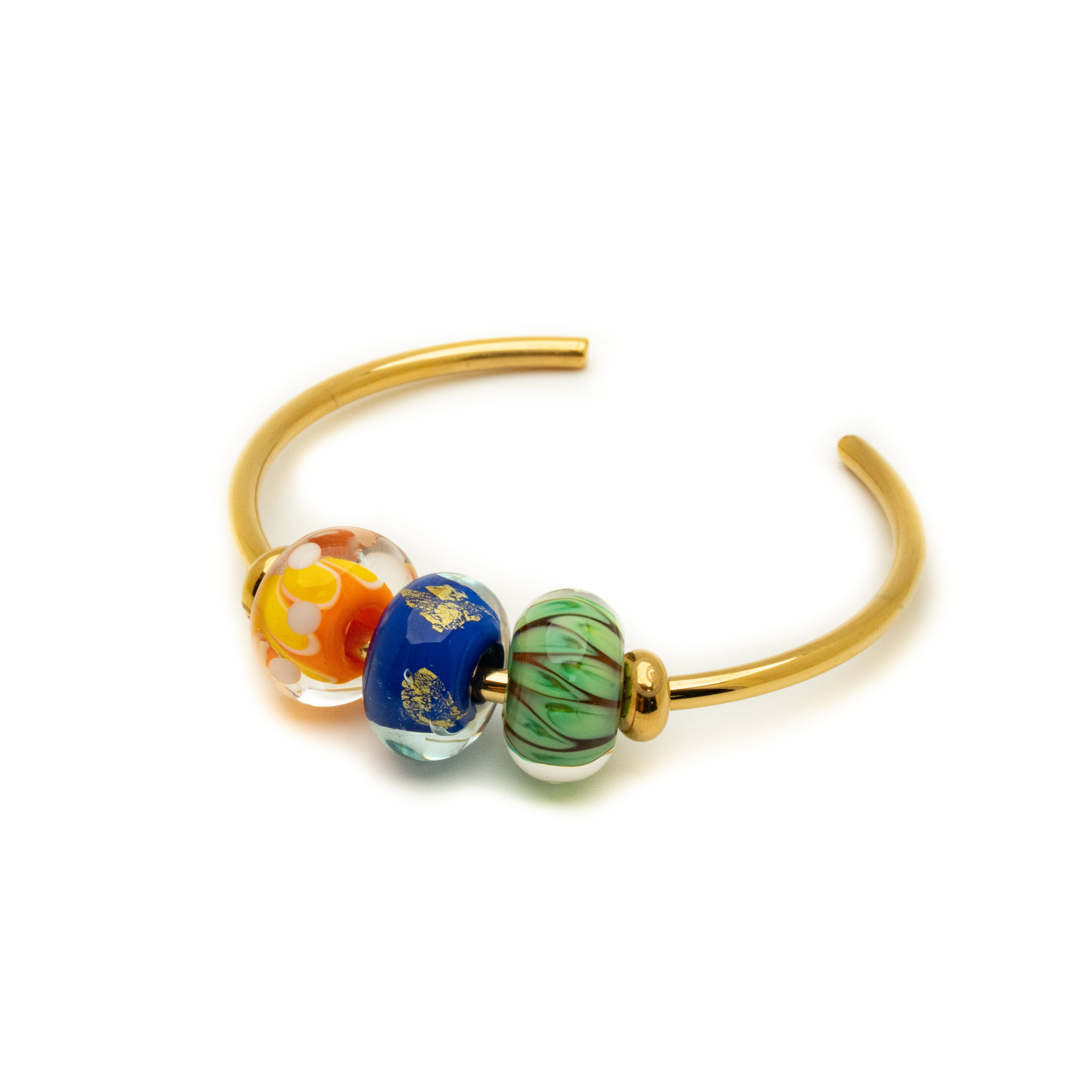 Gold bracelet with colorful beads on a white background