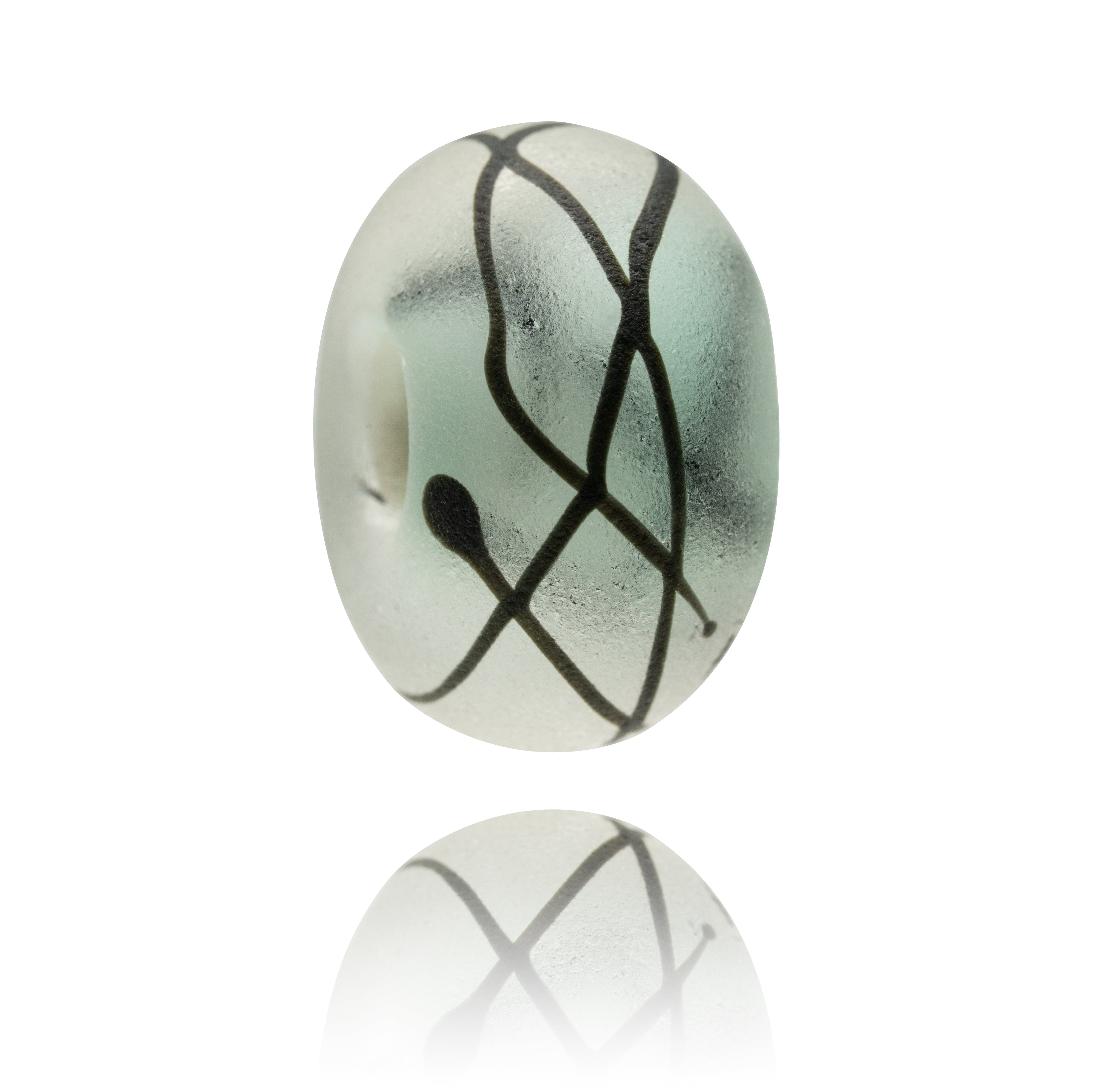 Frosted glass bead with black stripes across the surface.