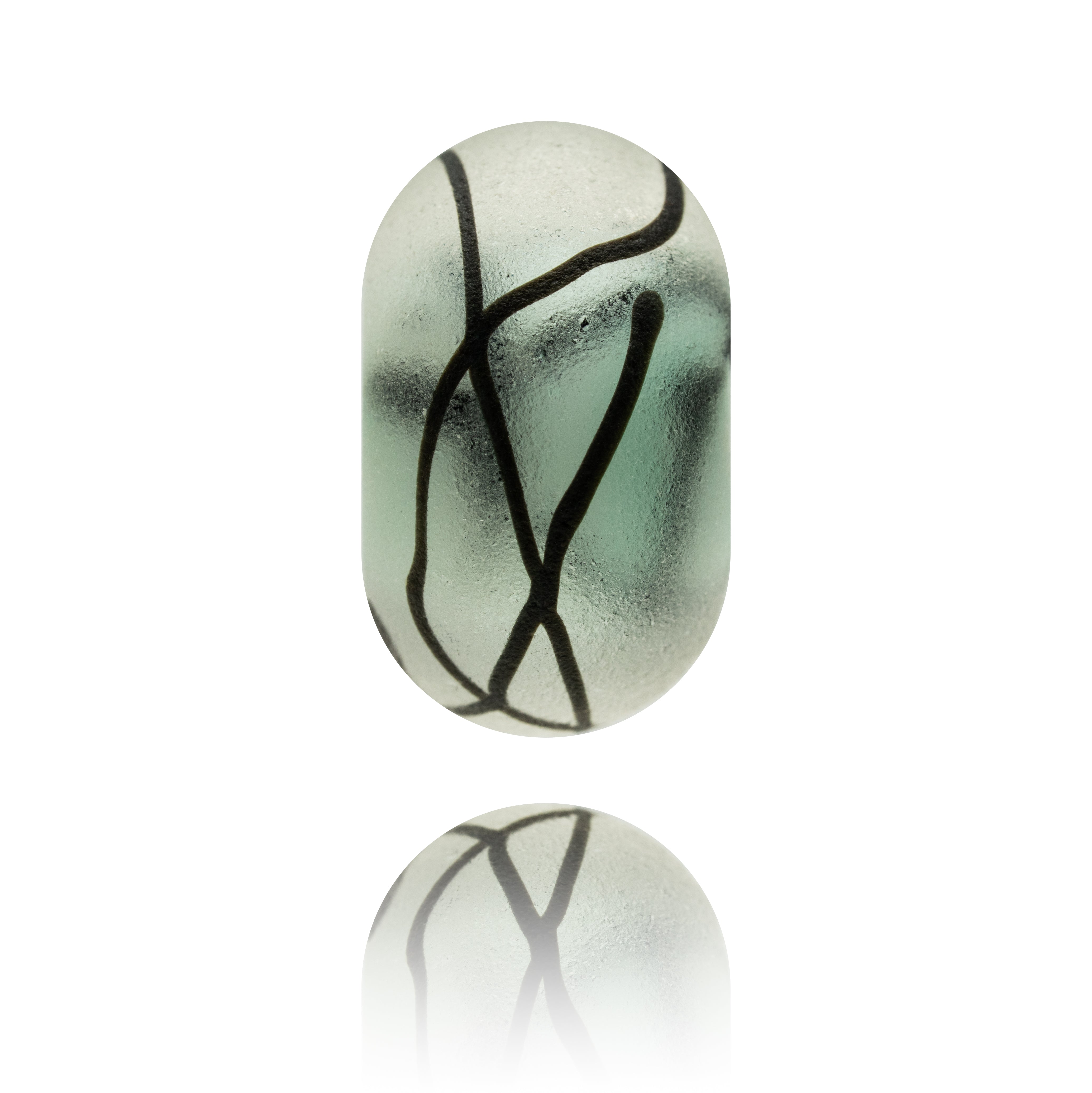 Frosted glass bead with black stripes across the surface.