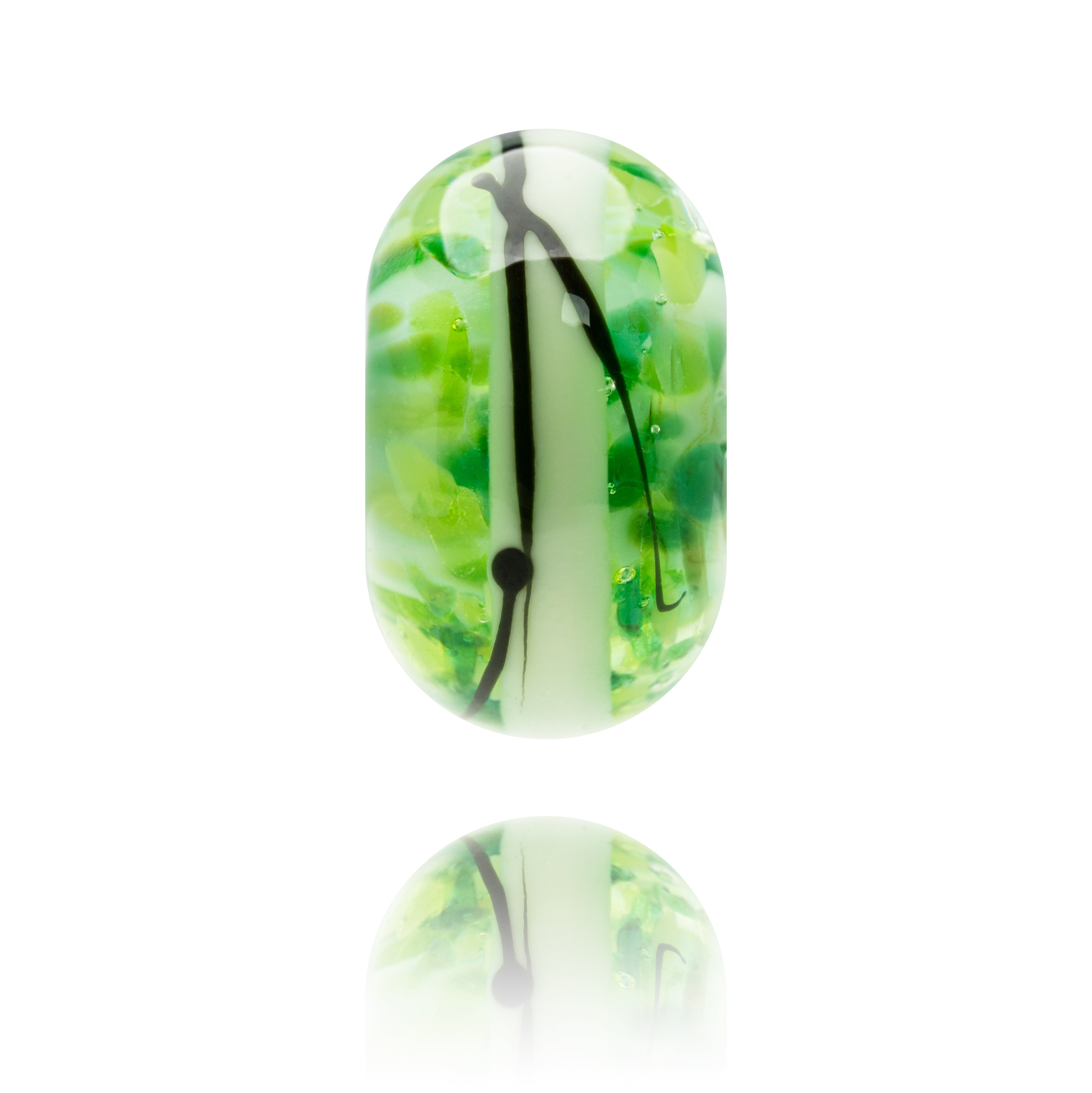 Green and white marbled glass bead on a white background