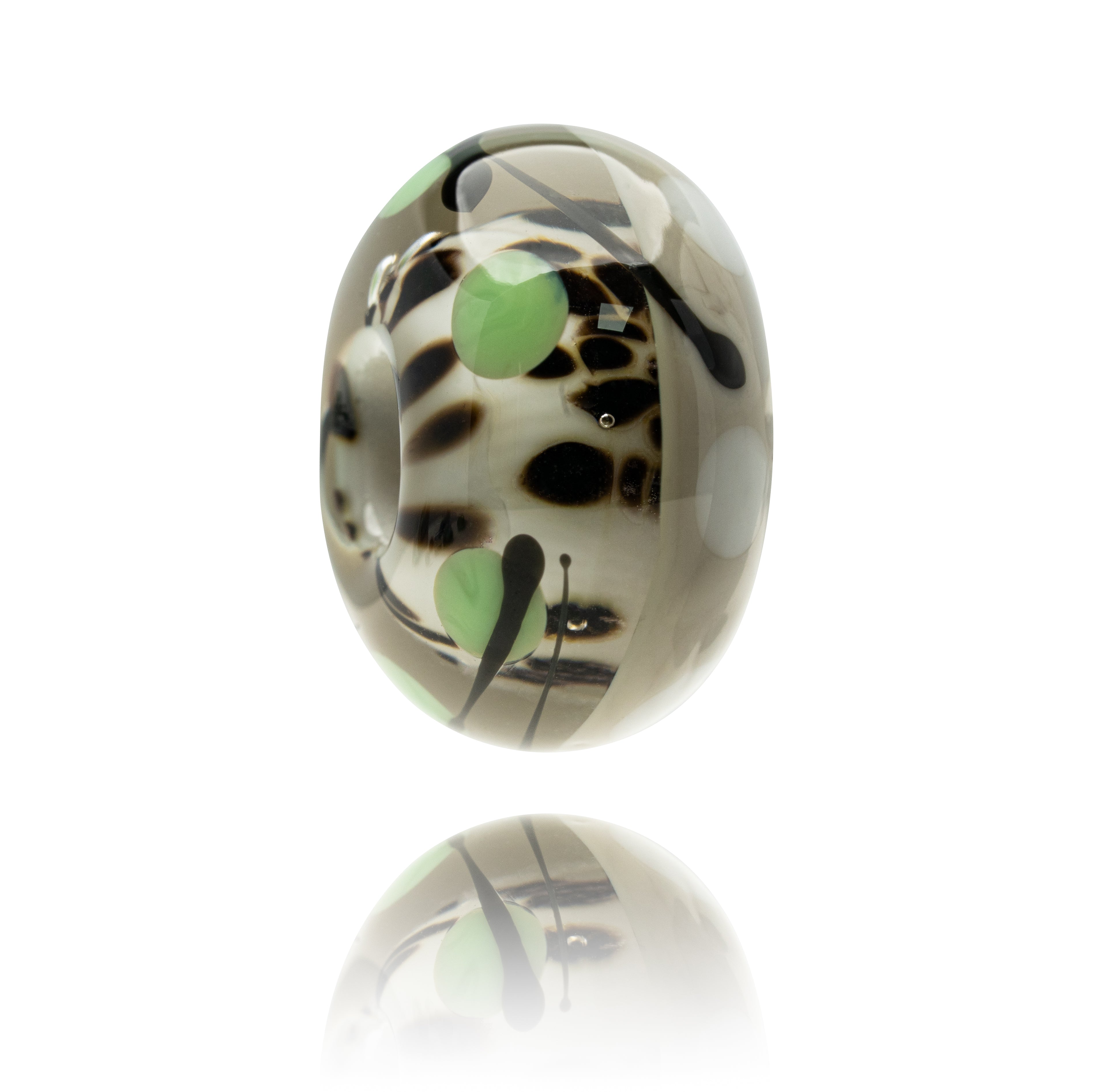 Grey glass bead with black dots on the surface and black stripes.