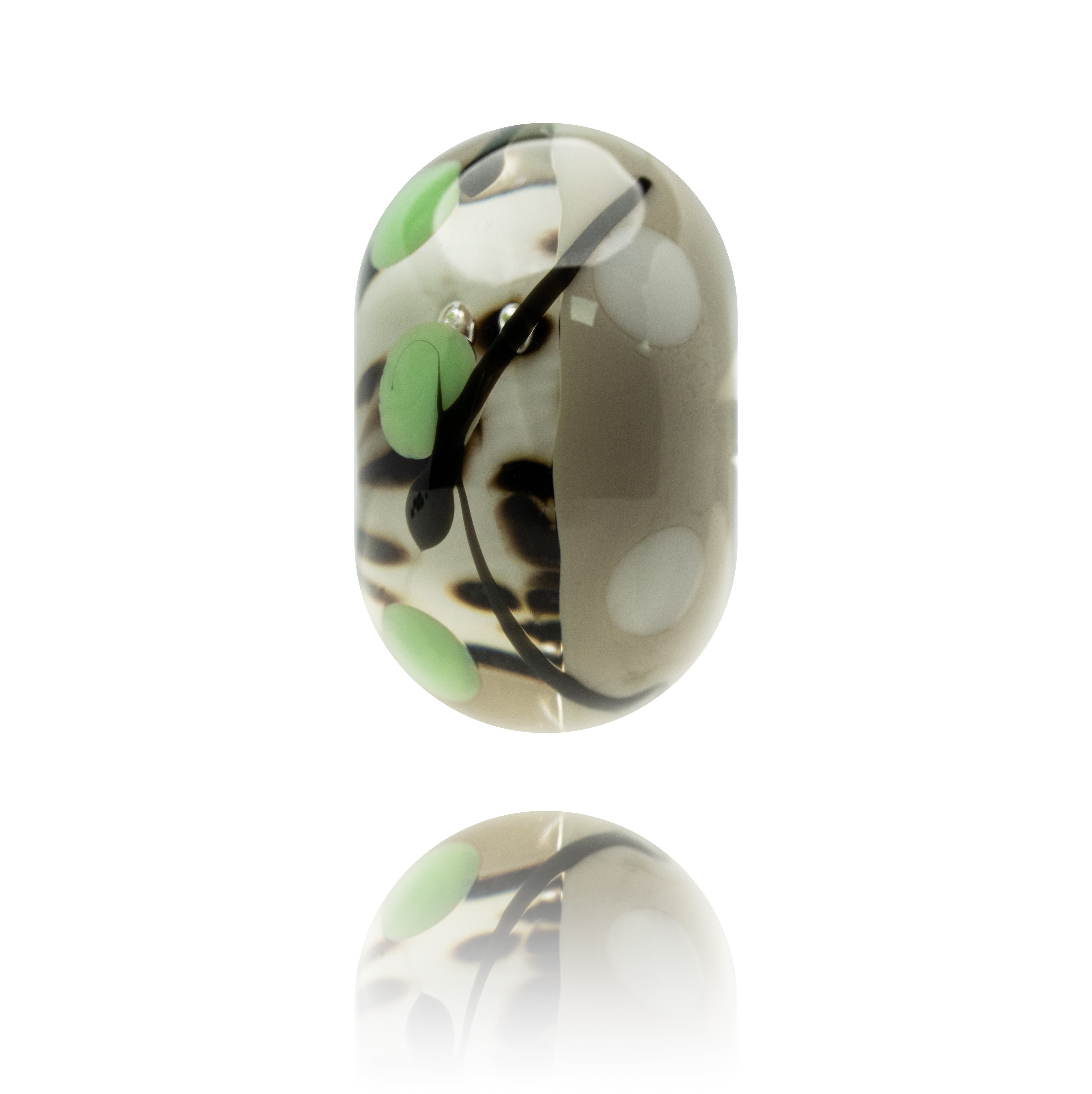 Grey glass bead with black dots on the surface and black stripes.