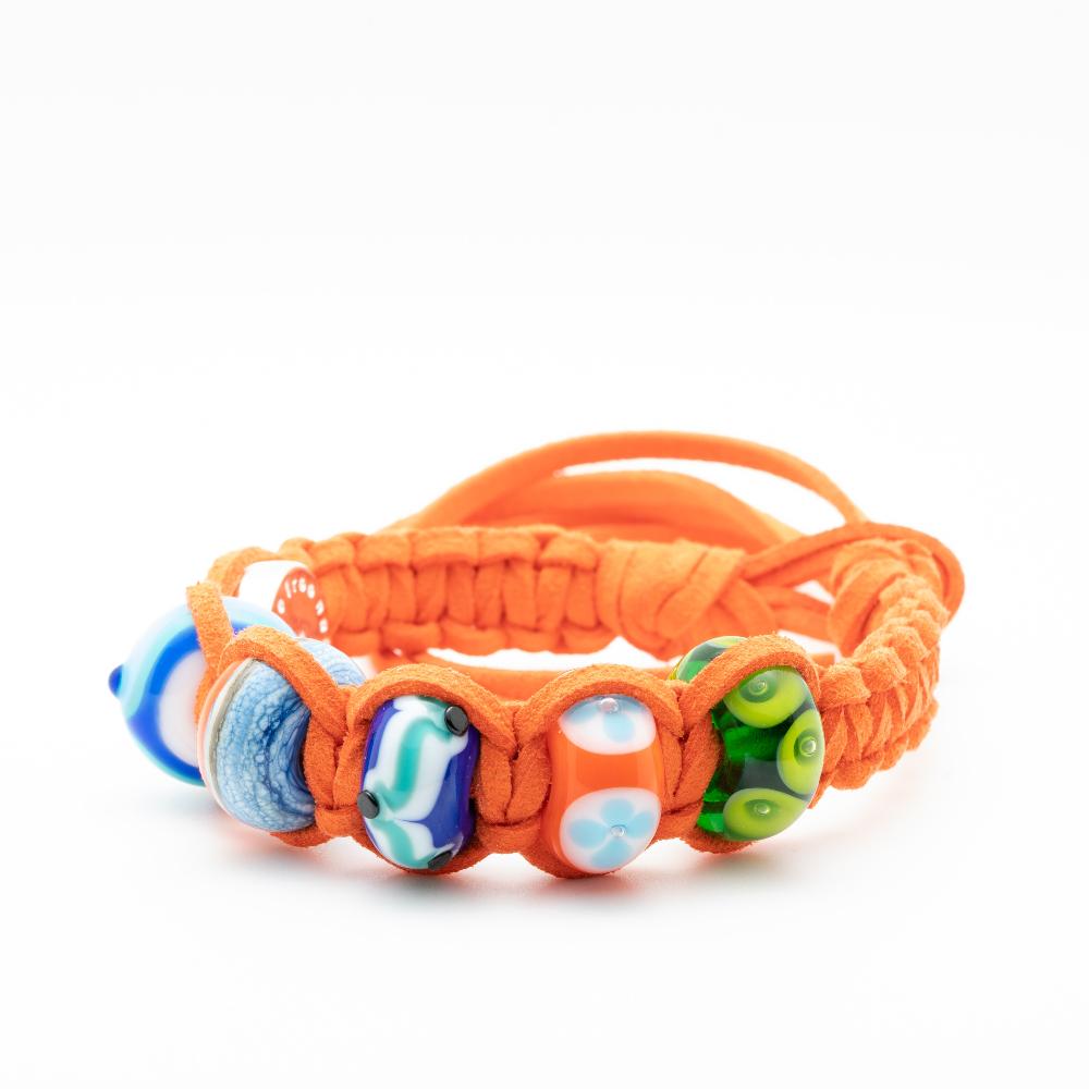 Bright orange cord bracelet with blue, green and orange handmade glass beads.