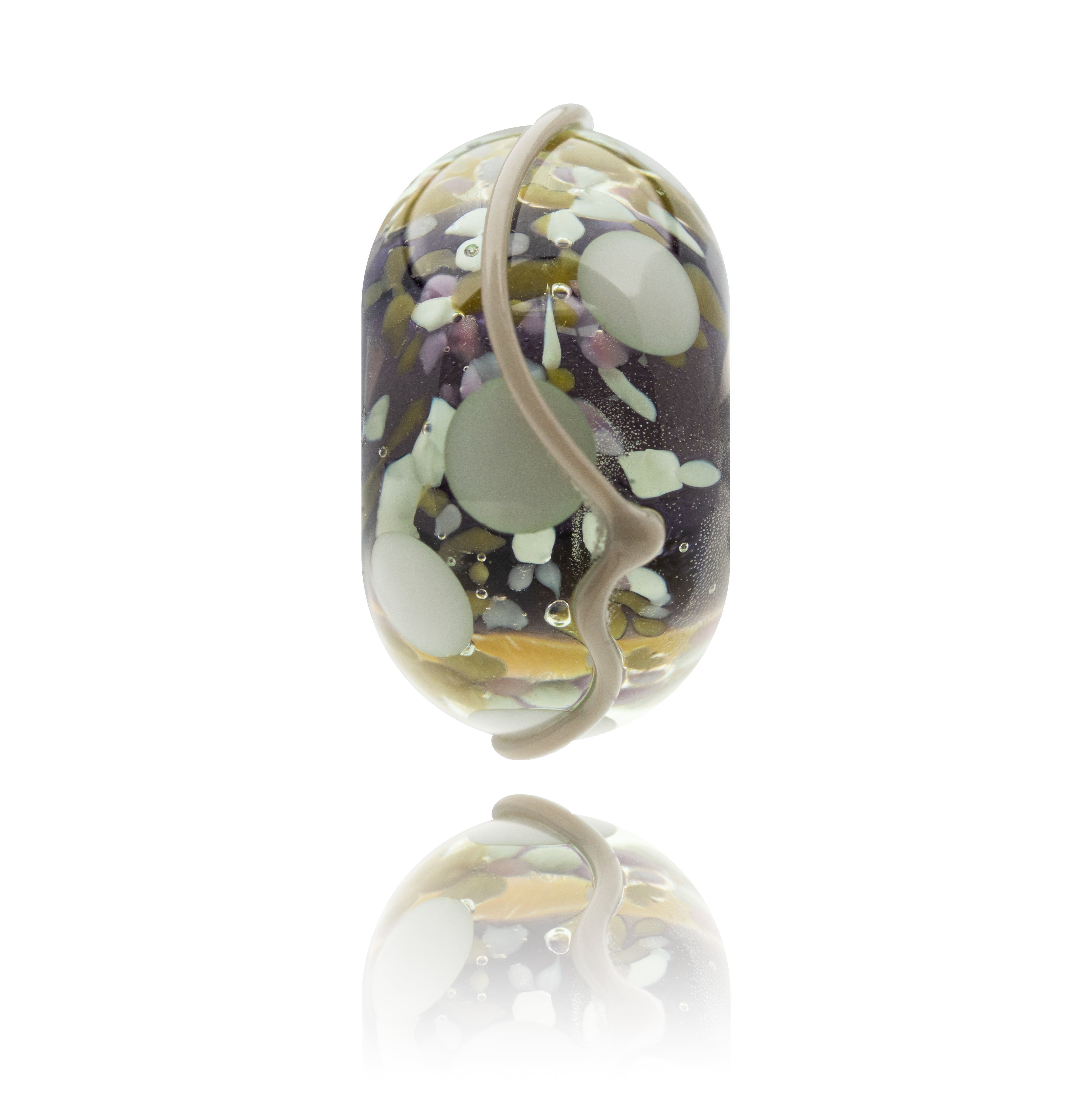 Dark purple glass bead decorated with white, green and grey dots and a grey stripe.
