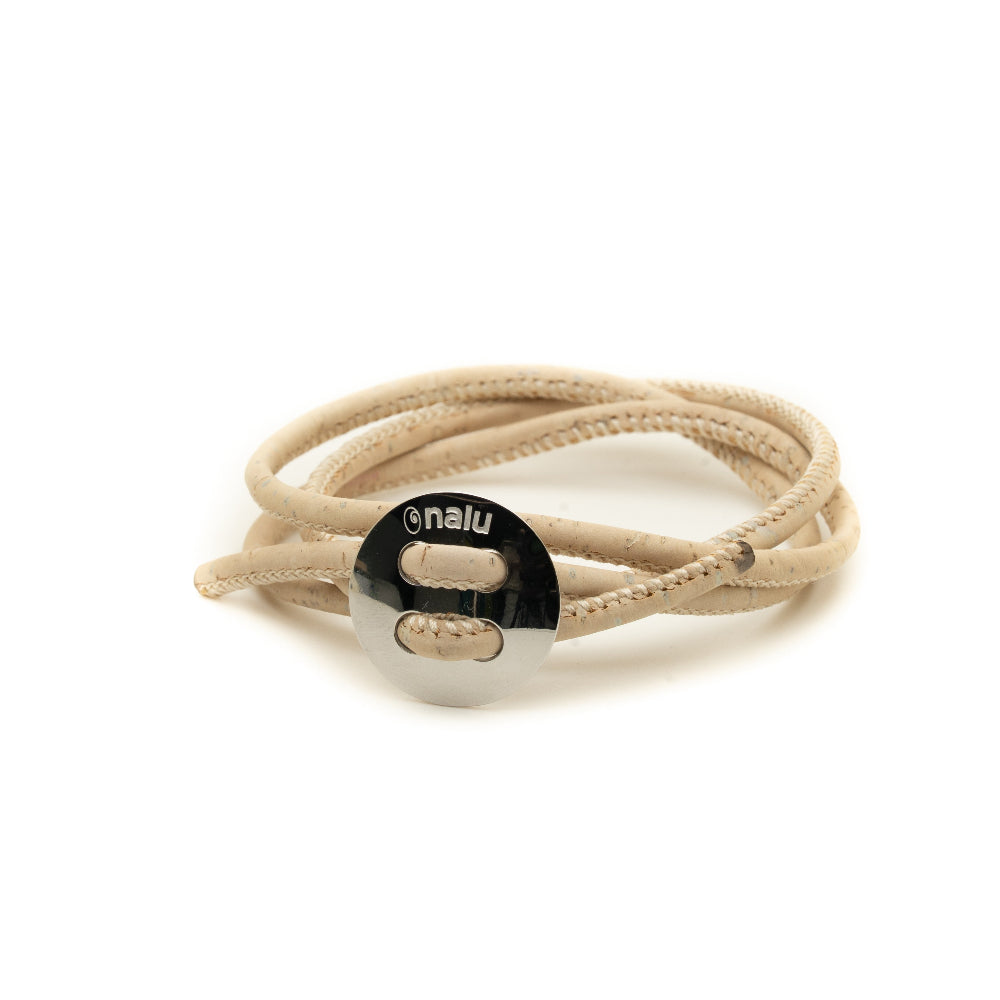 Beige braided bracelet with a black metal clasp on a white background