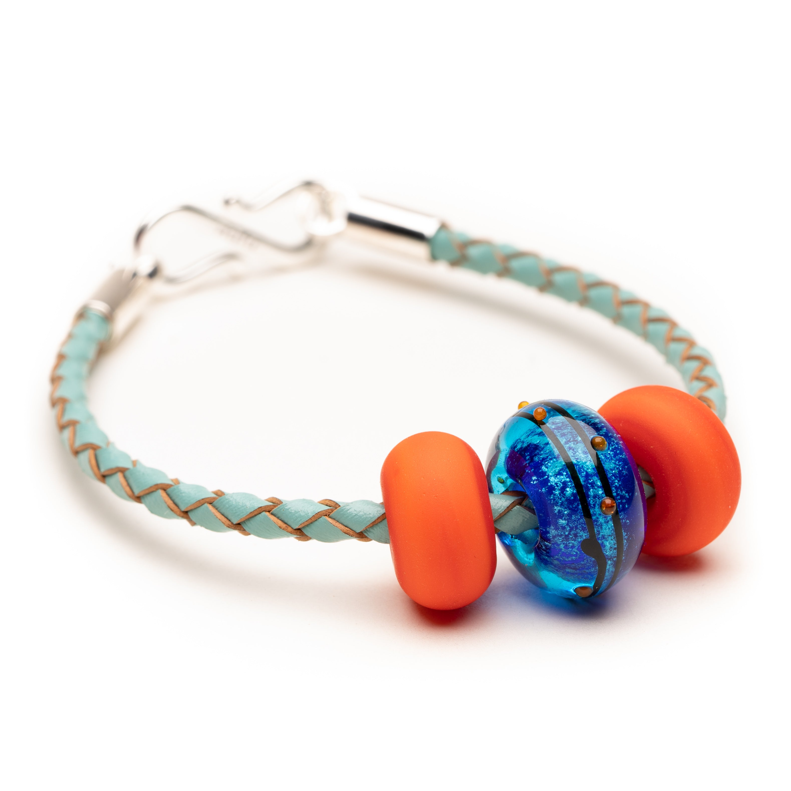 Blackpool beach bead on turquoise leather bracelet.