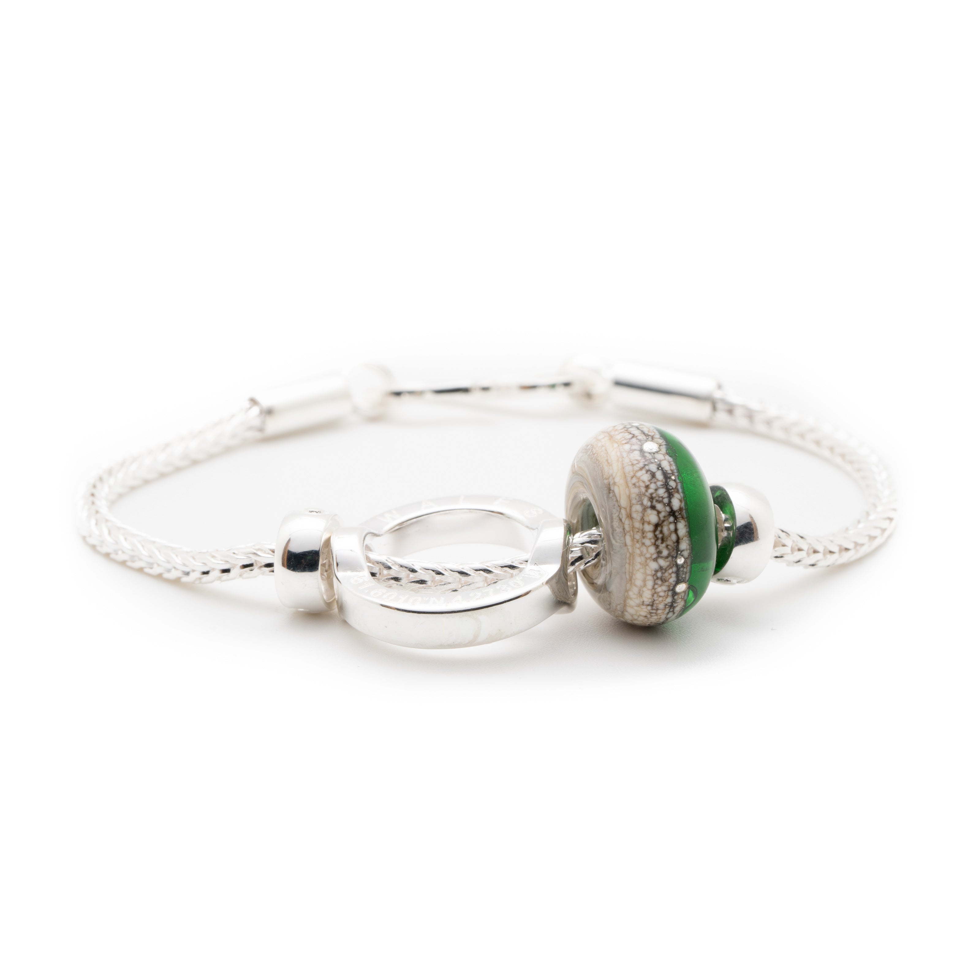 Grey and green glass bead on silver bracelet with silver charm for Wales.