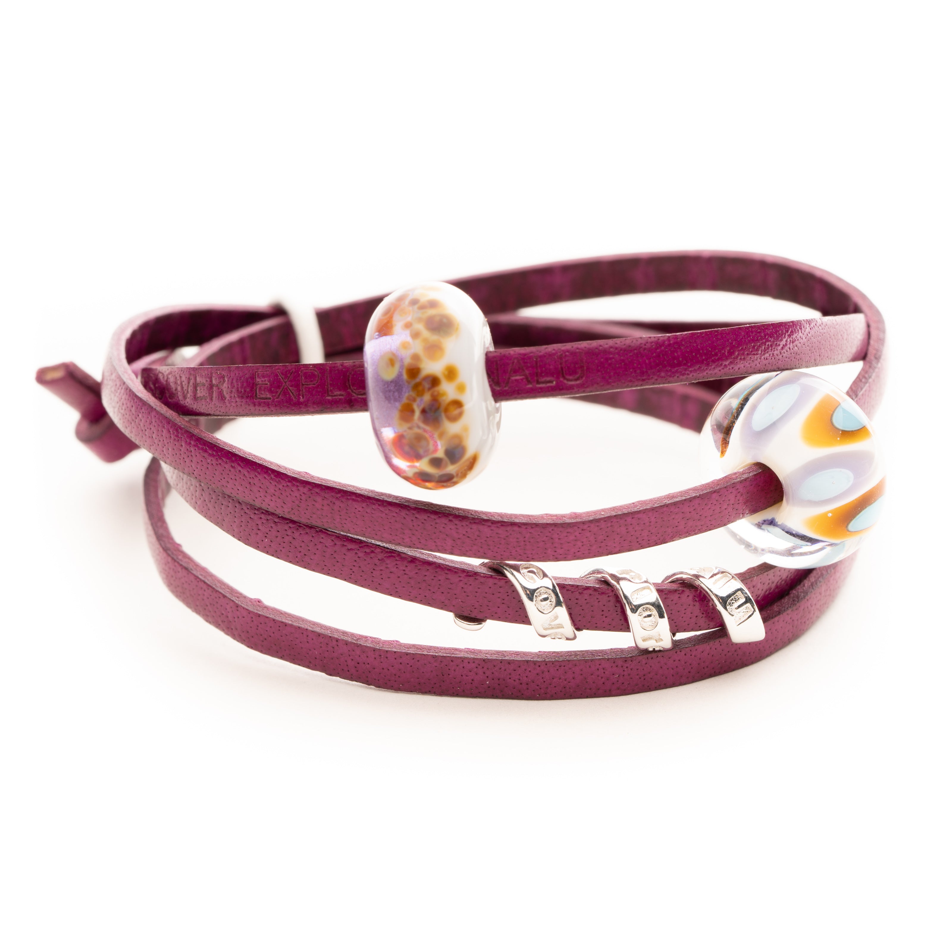 Magenta leather wrap with glass and silver beads for Widemouth By a and Crackington Haven.