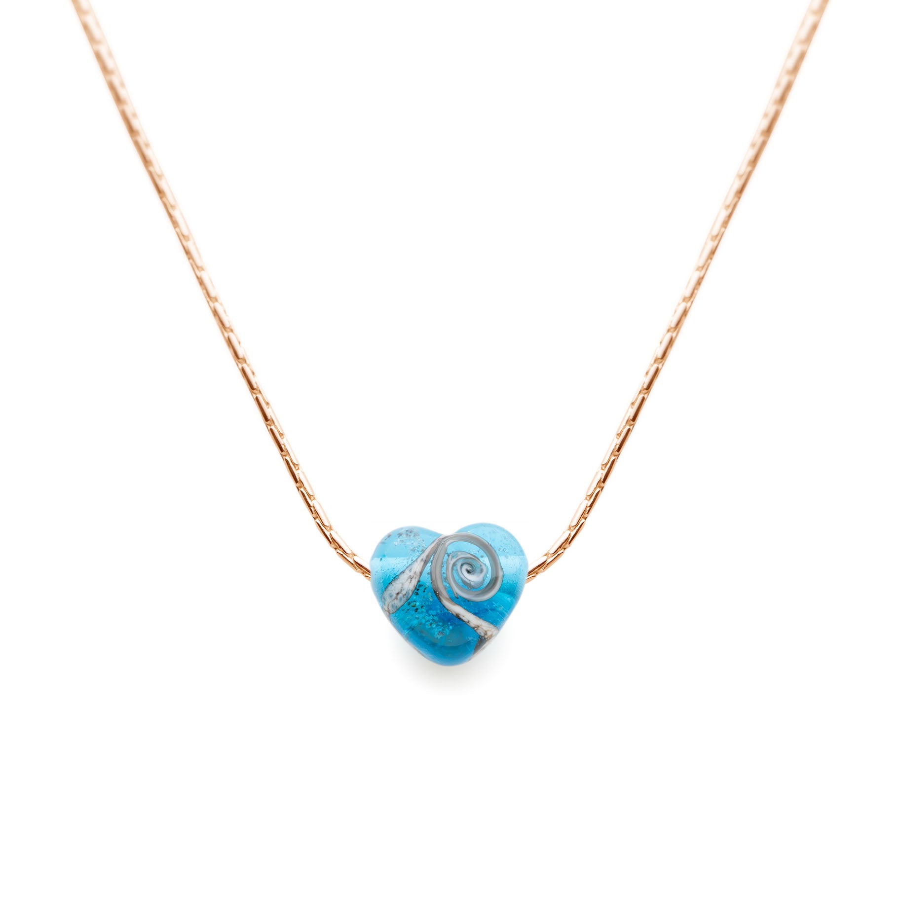 A heart-shaped turquoise glass bead with a gold-filled chain and a gold bolt ring clasp, with an engraved gold Nalu Swirl tag.