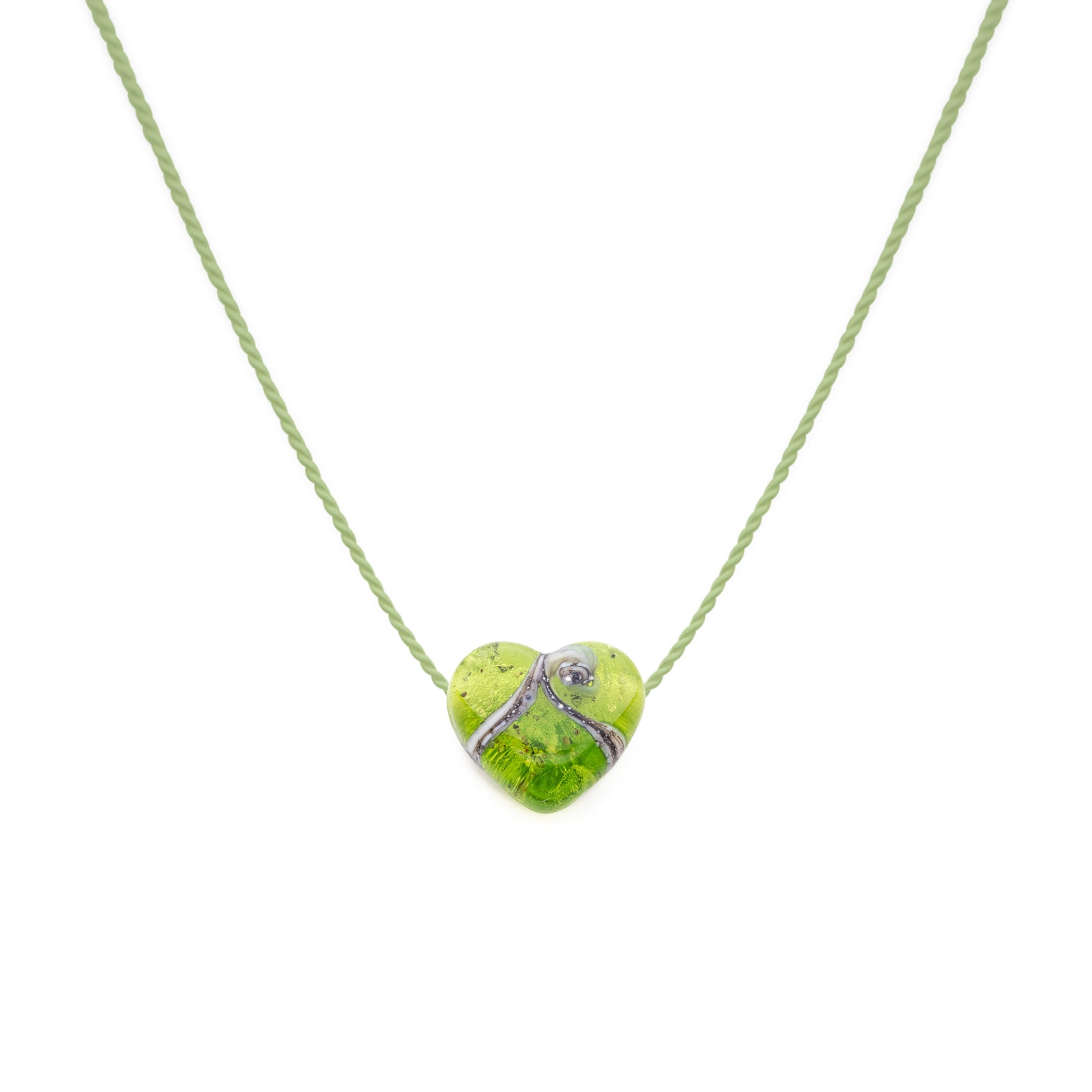 Apple green coloured glass heart shaped bead with grains of sand from your chosen beach in the glass, strung on a silk necklace.