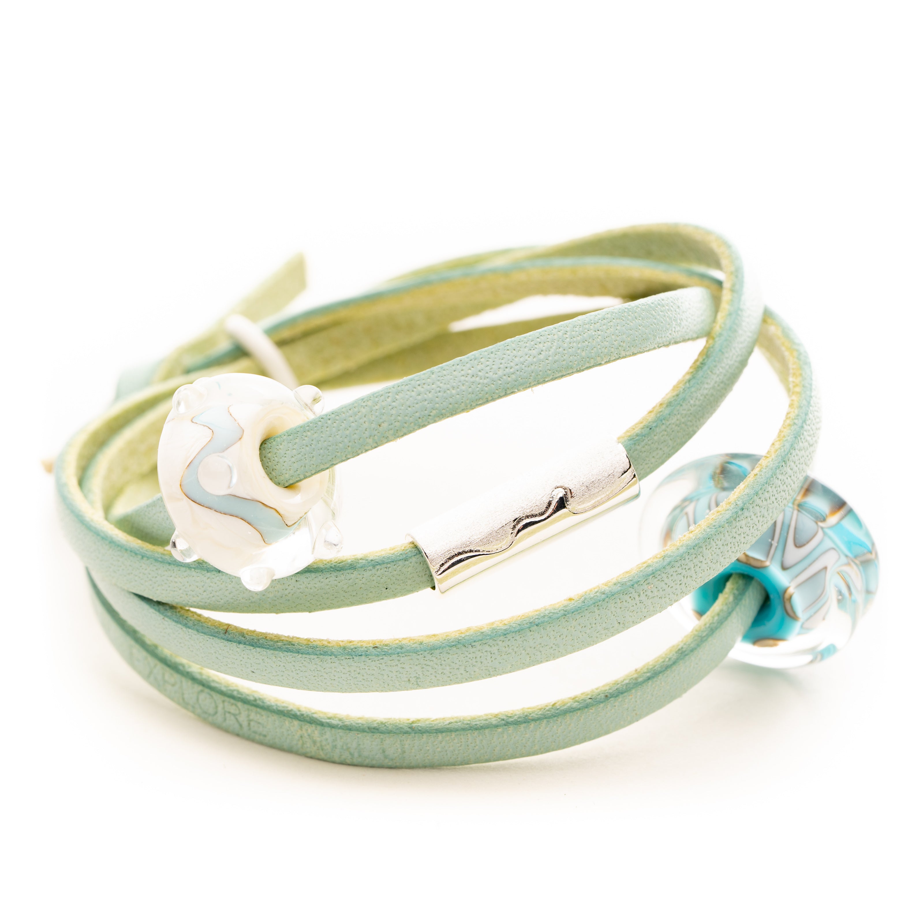 Aqua coloured leather wrap bracelet with North Devon silver coast bead and glass beads for Croyde and Saunton.