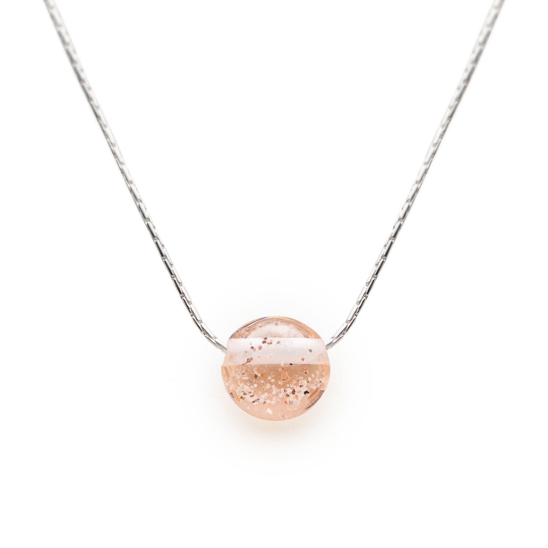 Sterling silver necklace with peach coloured glass pebble with your chosen beach sand melted into the glass.