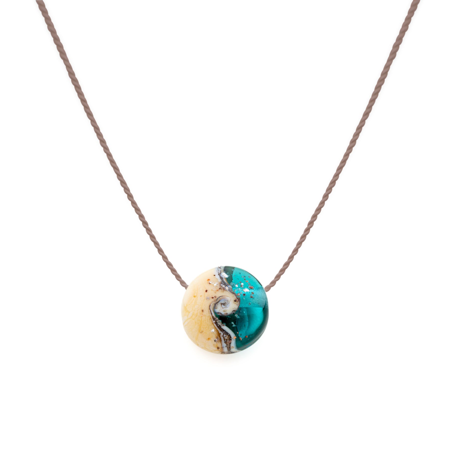 Shoreline inspired glass bead in teal and sand coloured glass with your chosen beach sand pressed onto the surface strung on a silk cord necklace.