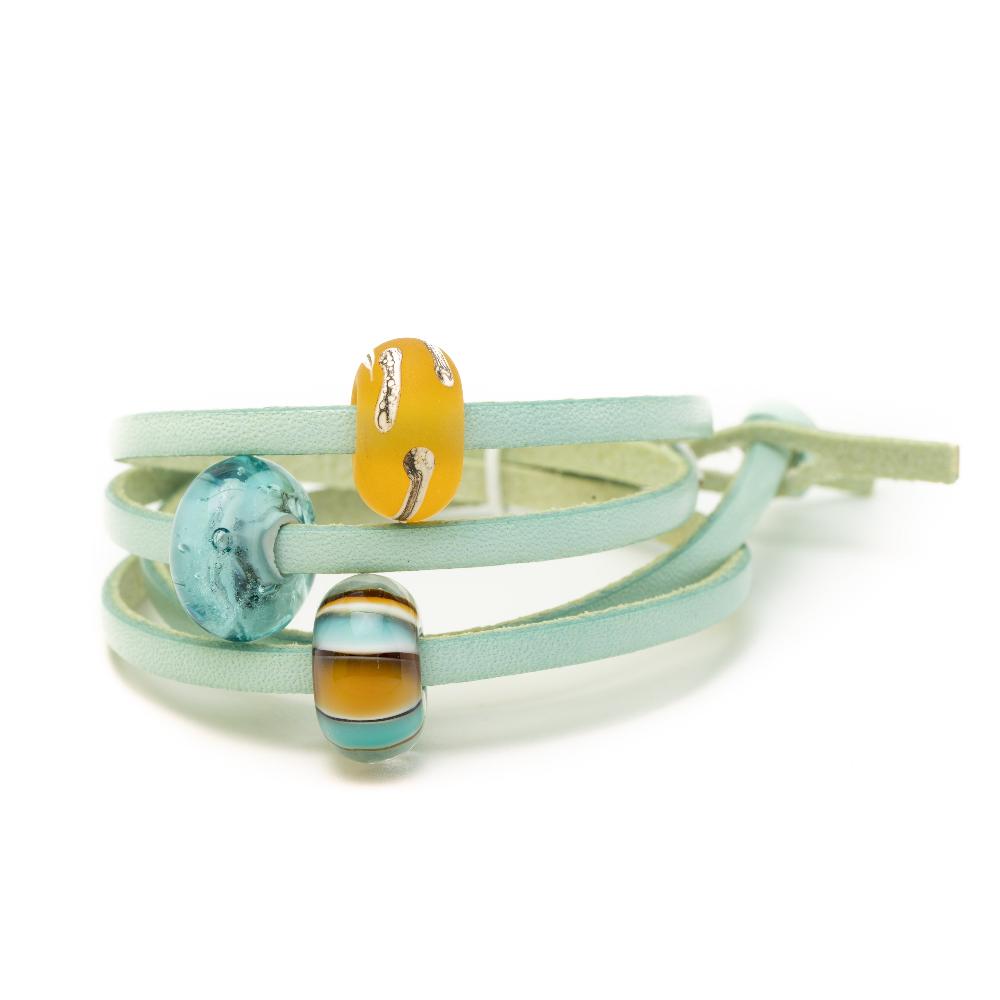 Aqua leather wrap bracelet with glass beads.