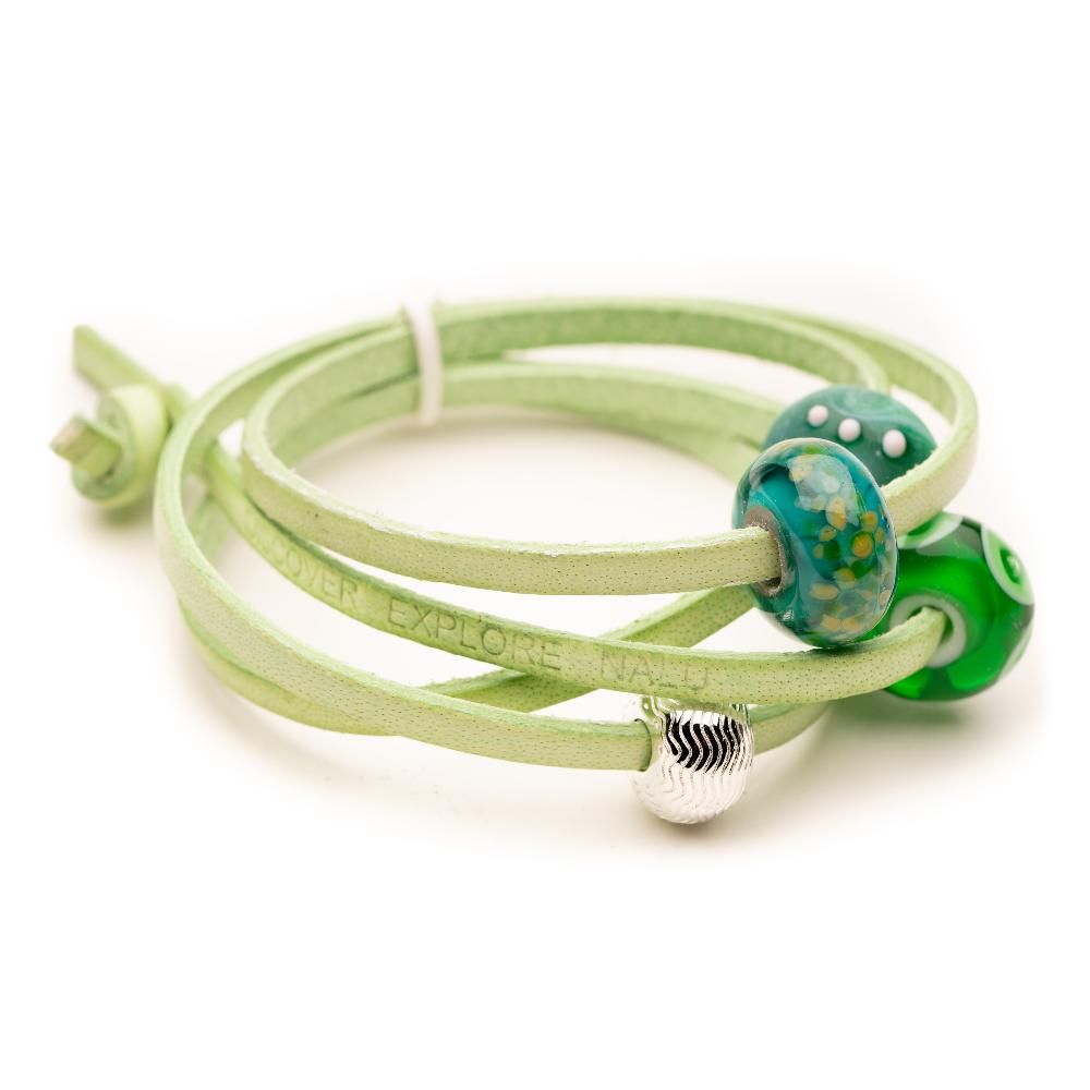 Mint leather wrap with green glass beads and silver beads.