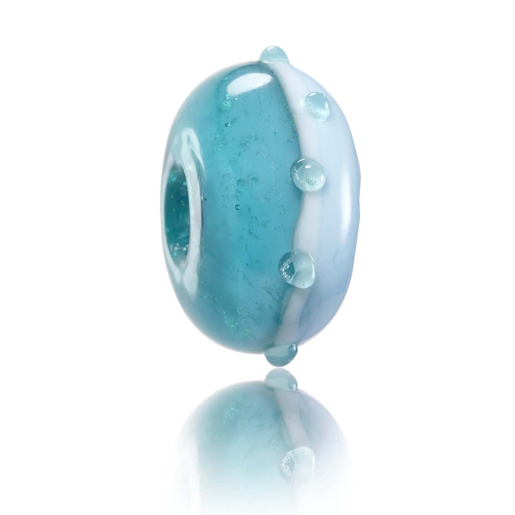 Blue glass bead with raised dots on surface representing Bigbury Bay in South Devon.