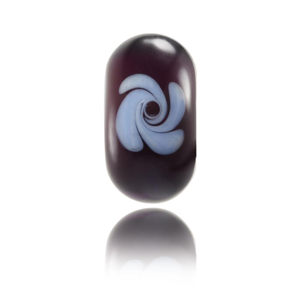 Dark purple glass bead with light purple flower style decoration on the surface. Designed for Lafitenia in France.