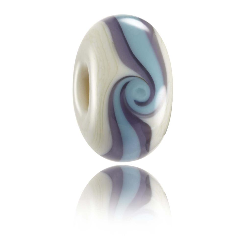 Cream glass bead with a purple and blue stripe around the middle with a twisted swirl, representing Lusty Glaze beach in Cornwall.