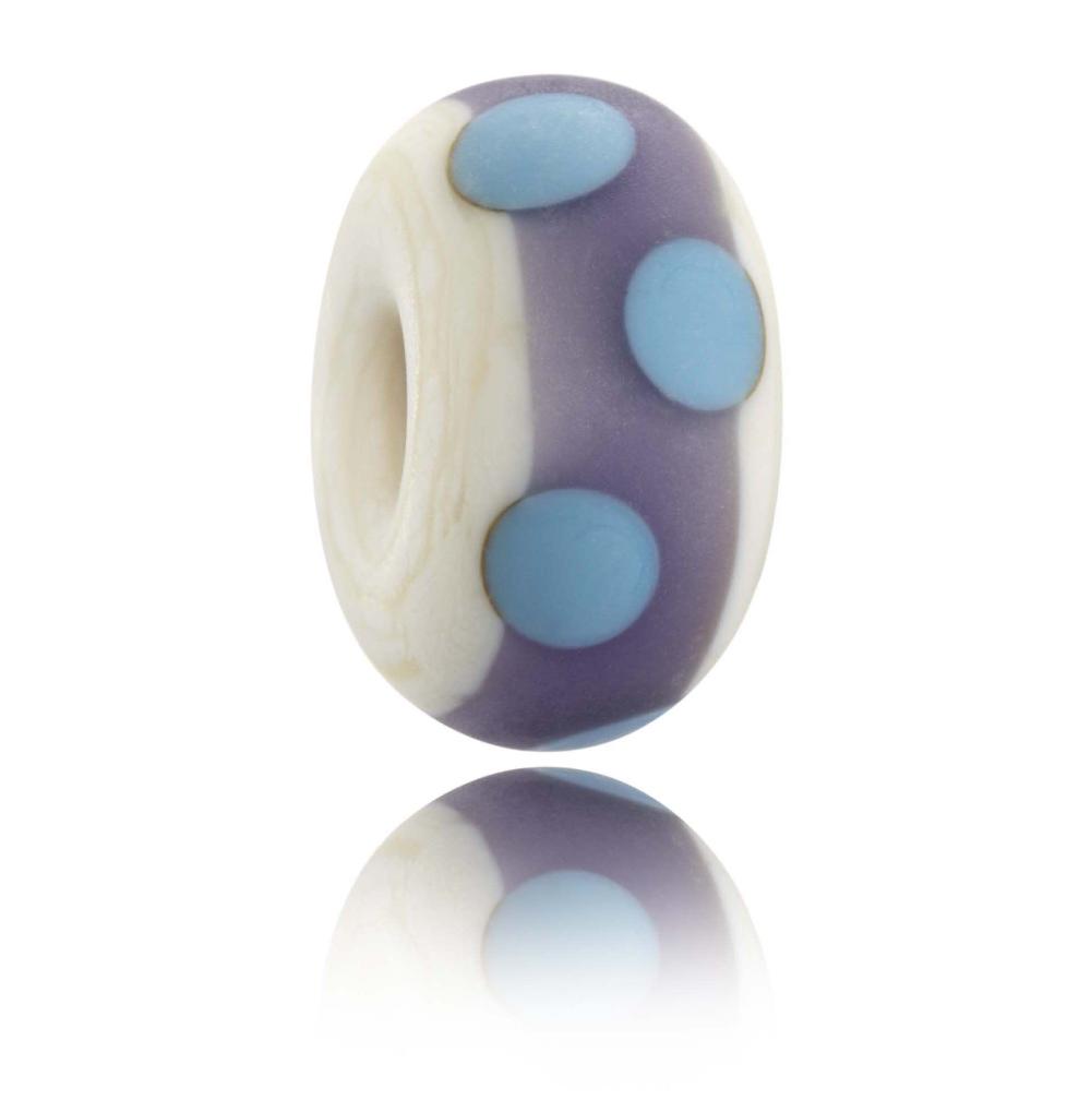 Cream glass bead with a purple stripe around the middle with turquoise dots, with a textured sea glass finish. Representing Mawgan Porth beach in Cornwall.