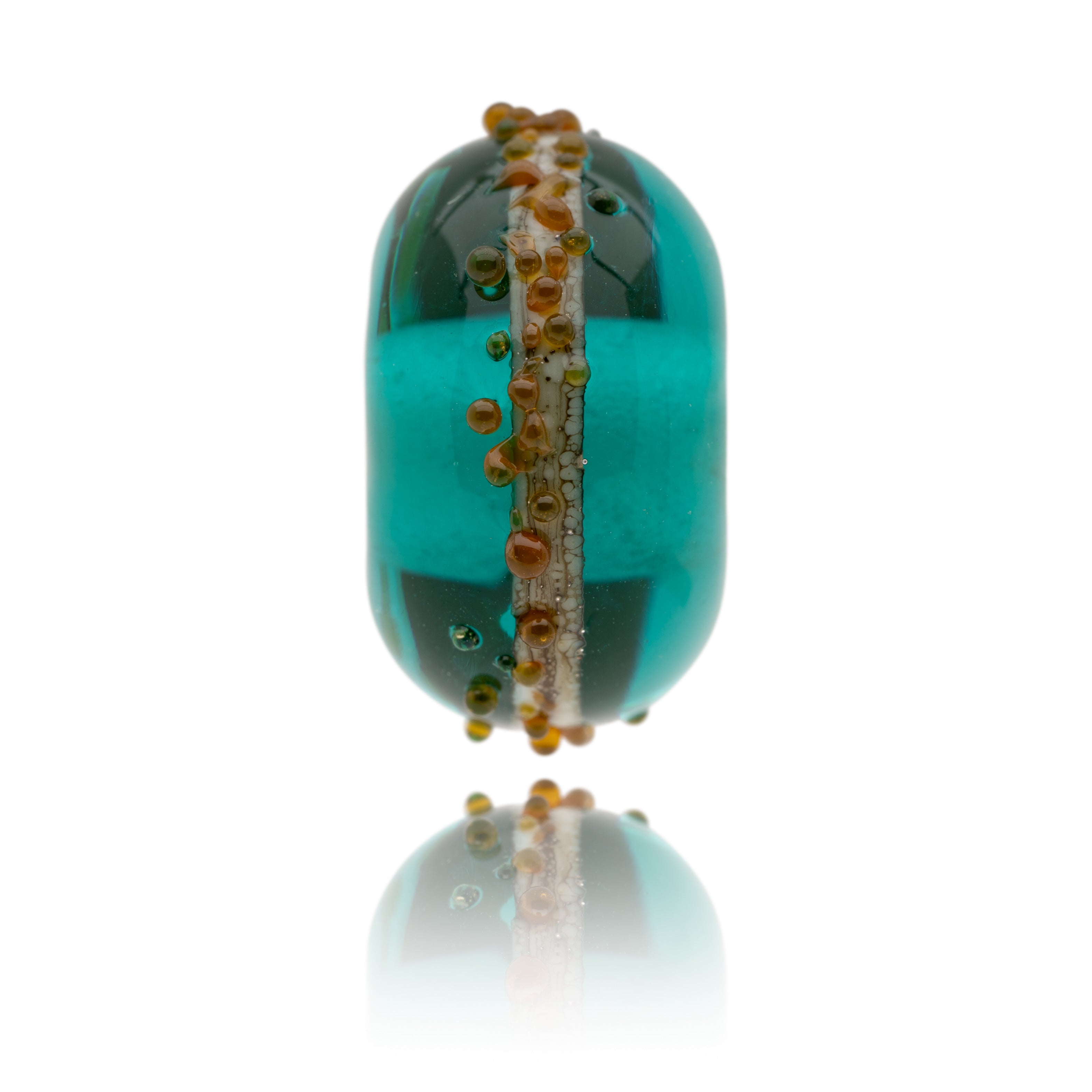 Transparent teal glass bead with silver and ivory stringer around the middle, representing Combe Martin in North Devon.