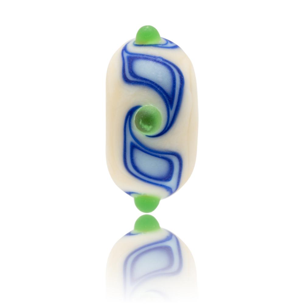 Cream glass bead with blue soil patterns and green dots on surface with a matte sea glass finish. Representing the Isle of Wight in the UK.